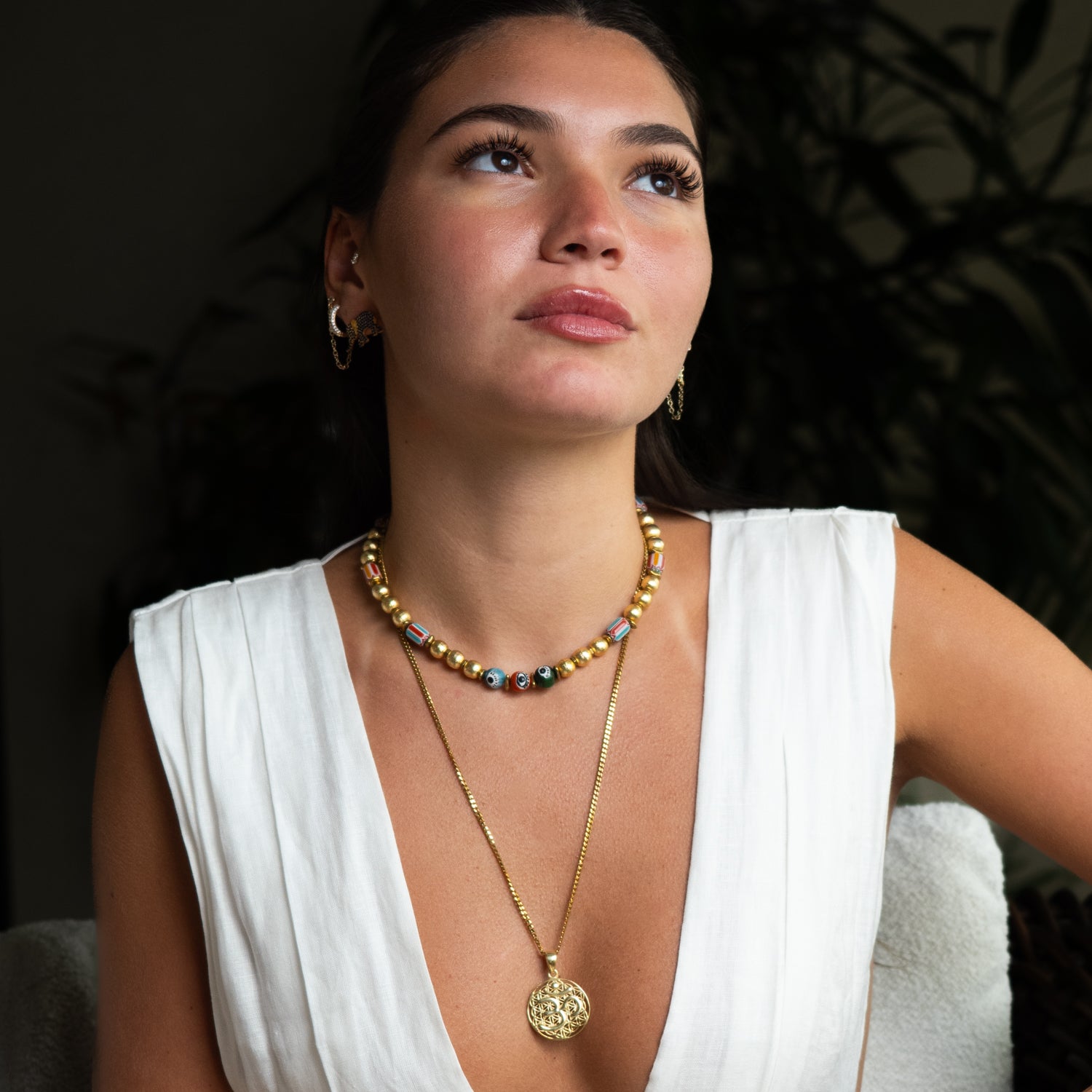 Model wearing Summer Love Sacred Heart beaded gold necklace with colorful beads and enamel heart pendant