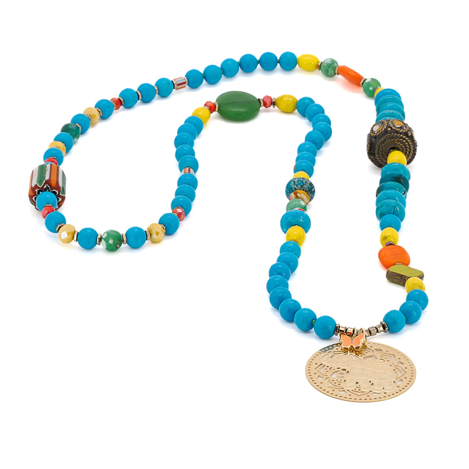 Handcrafted with care, the Colorful Therapy Elephant Turquoise Necklace features natural turquoise beads, African beads, and sparkling crystals, all accentuated by an 18K gold plated elephant pendant. 
