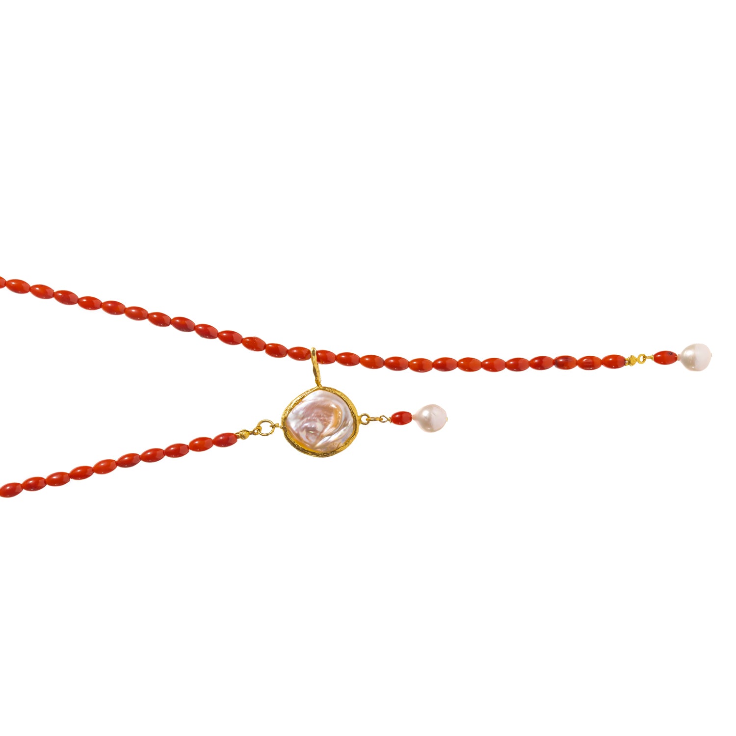 Detail of the adjustable pearl slide mechanism on the coral beaded lariat necklace, showing how the strand splits into a Y shape