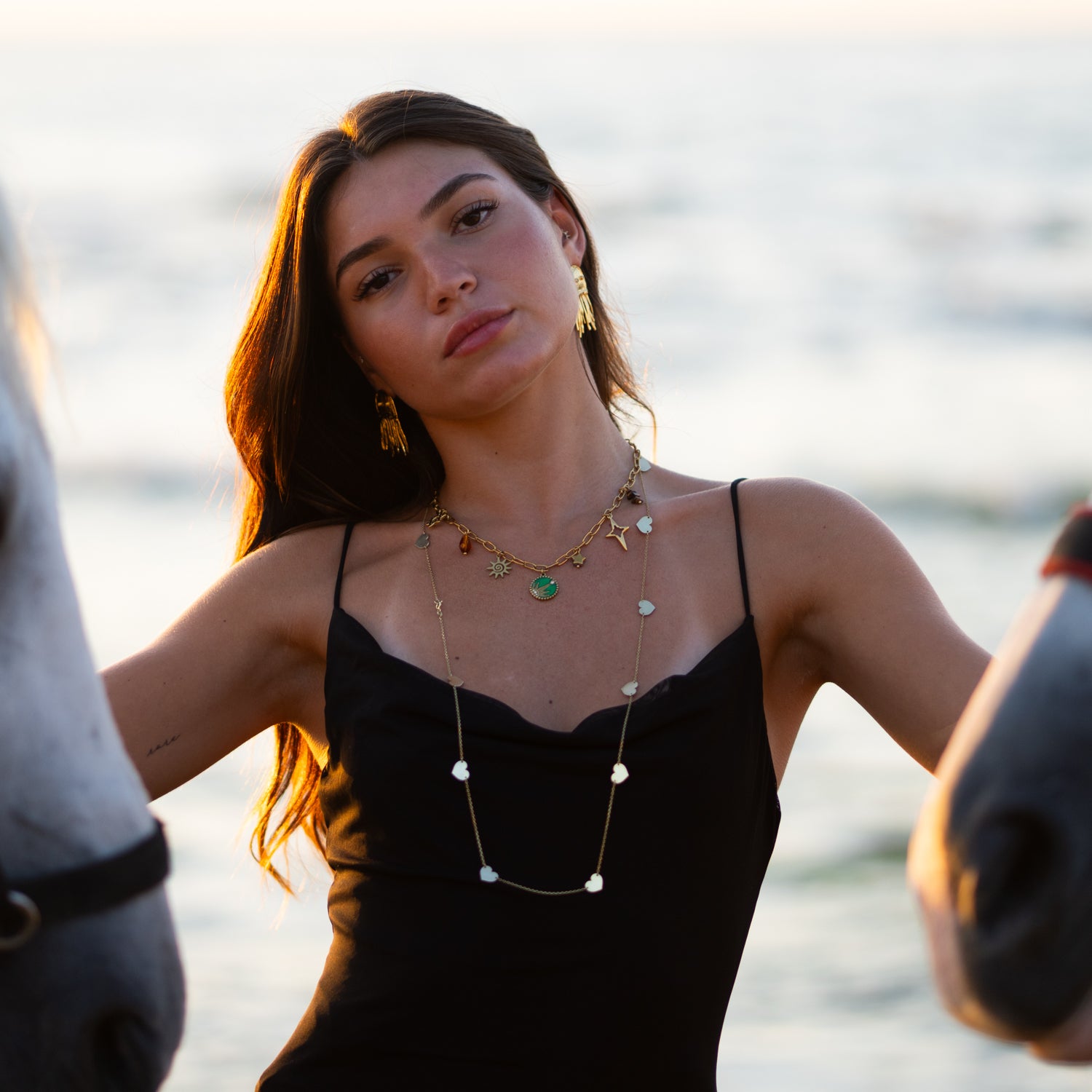 Boho-inspired Cosmic Energy necklace with symbolic charms for vitality and protection