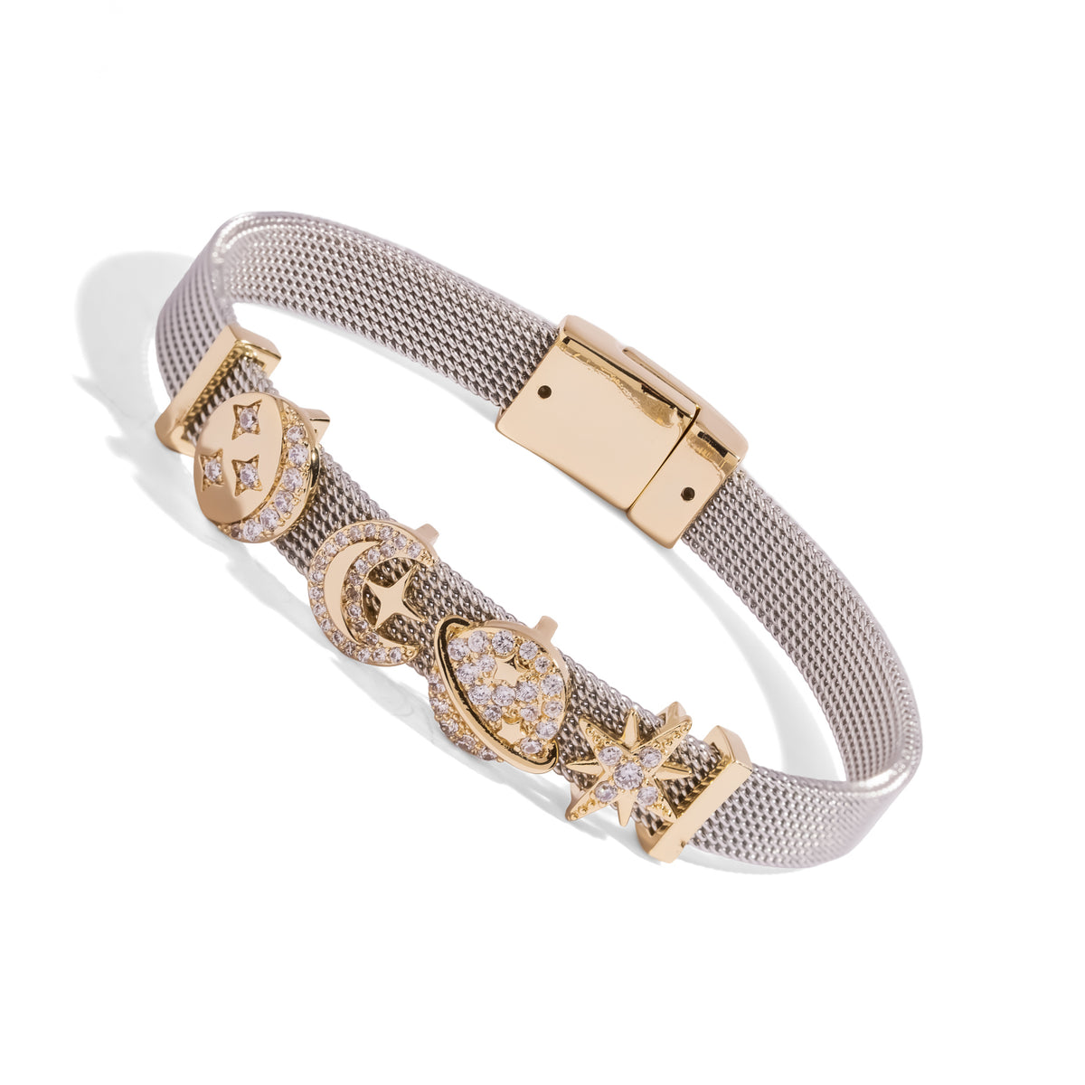 Angled view of the celestial silver charm bracelet with pave zircon charms and the gold plated magnetic clasp