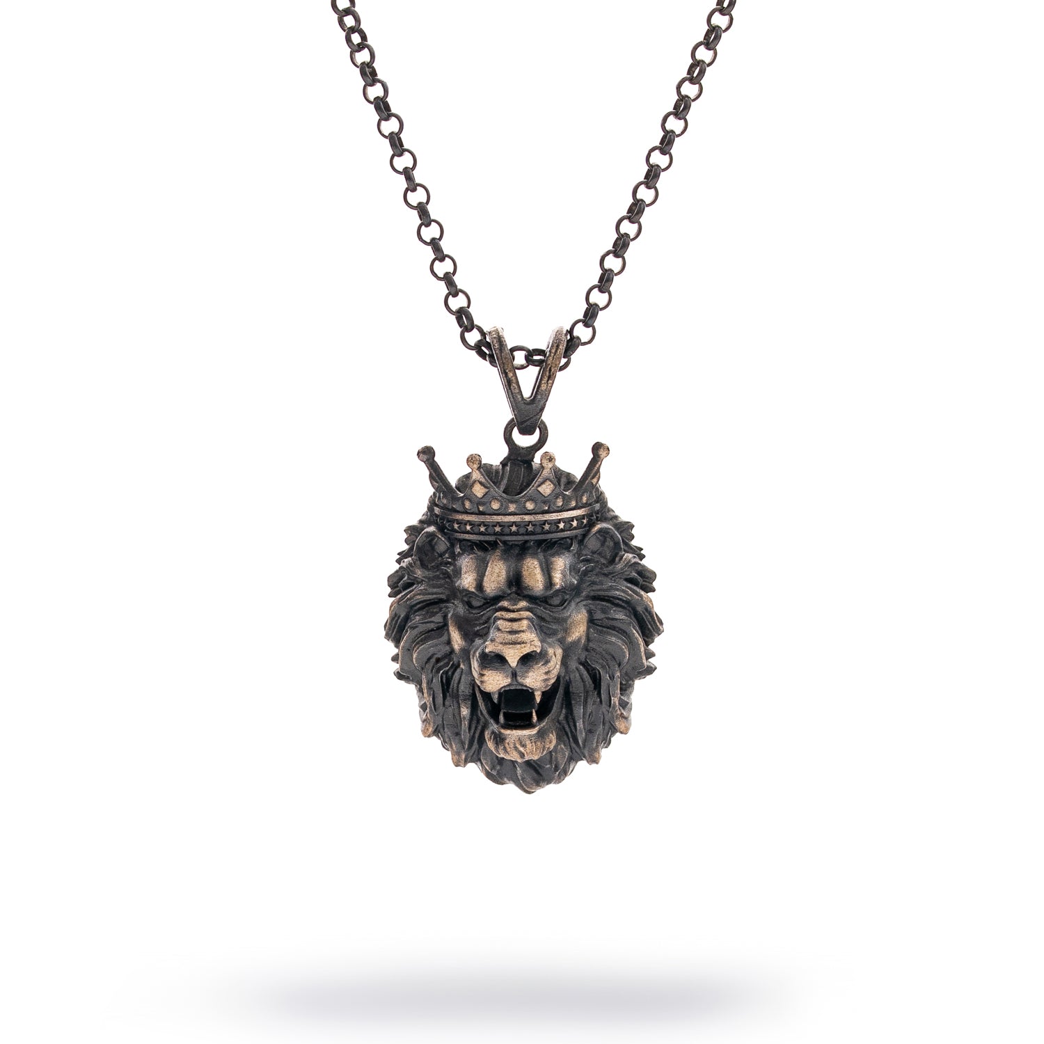 Sterling silver necklace with crowned lion head pendant, rhodium finish, black and silver details, regal design, bold masculine style.