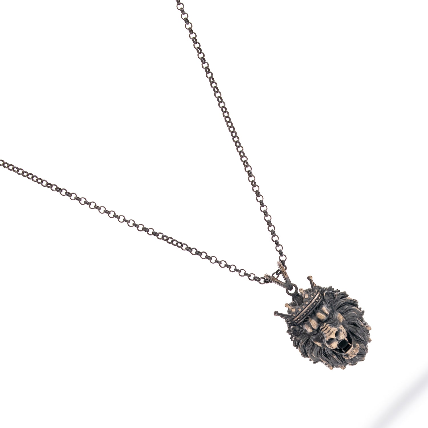 Sterling silver necklace with crowned lion head pendant, rhodium finish, black and silver accents, regal and bold masculine style.