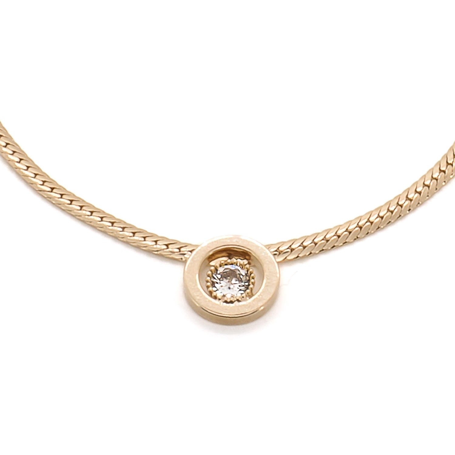 Detailed shot of the choker necklace, highlighting the intricate 14K gold plating and its exquisite craftsmanship.