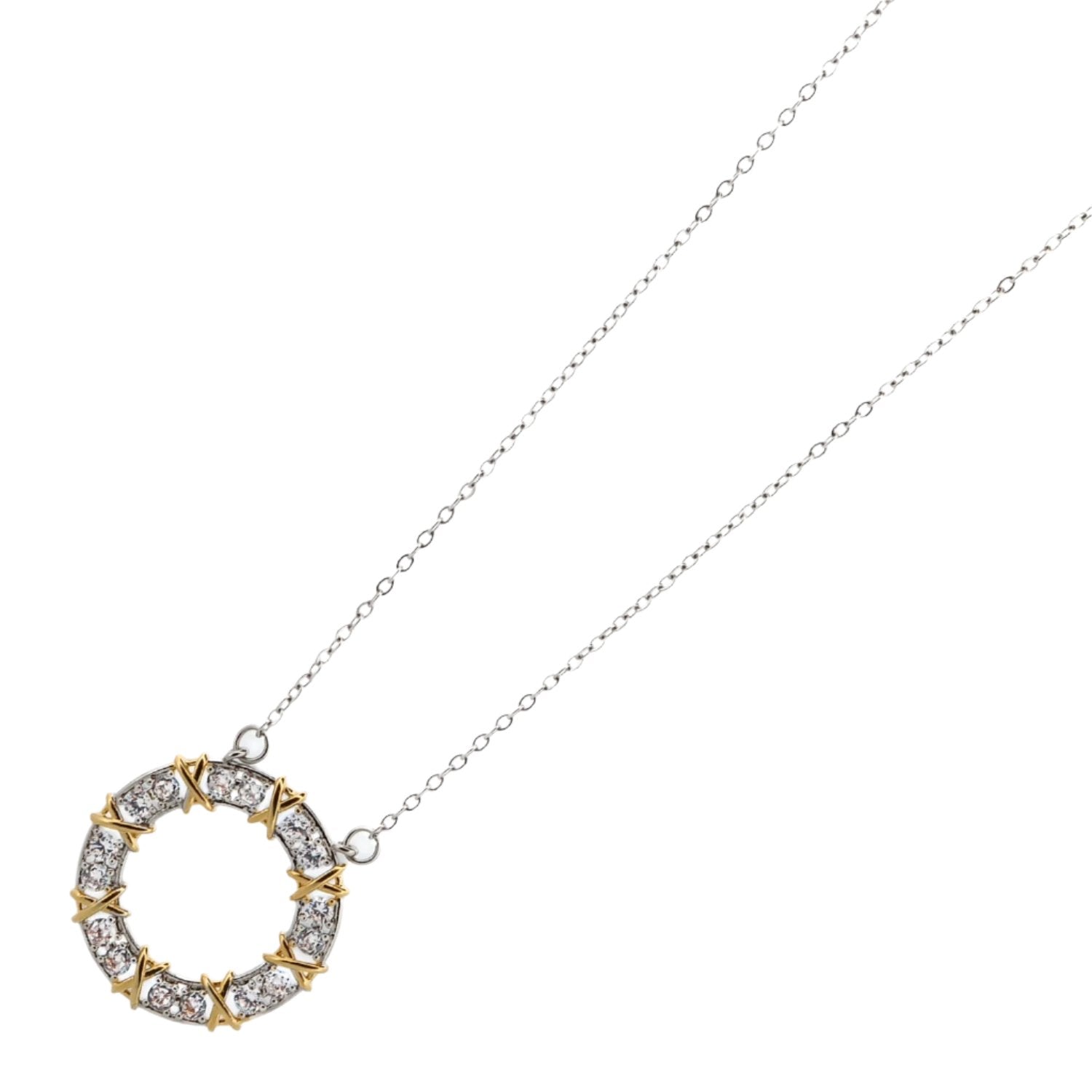 Silver chain necklace with a 1-inch round diamond-encrusted pendant and intricate gold X patterns.
