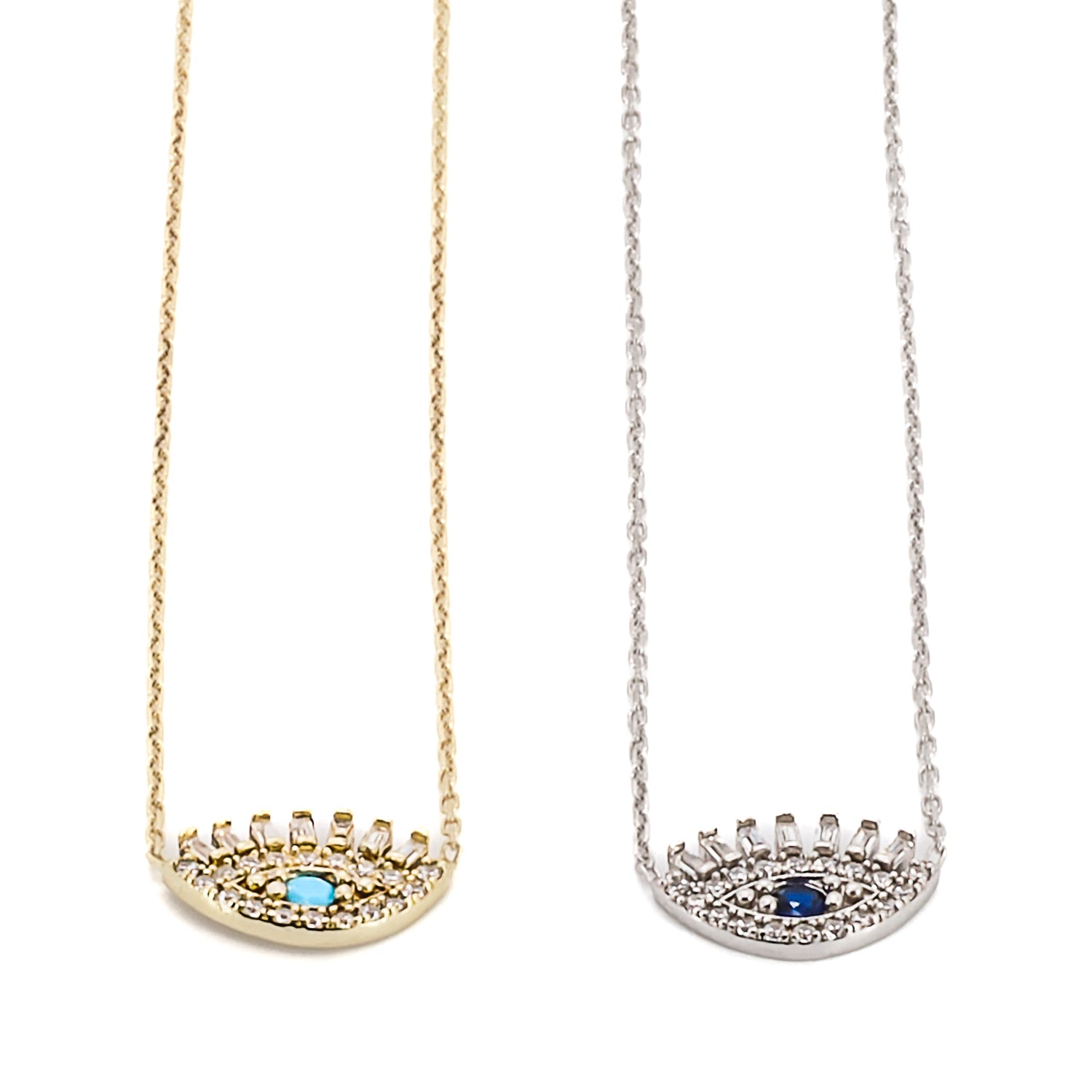 The Diamond Long Lash Necklace is a stunning piece of jewelry that is available in two color options. The first option is made of sterling silver with sapphire and zircon accents, while the second option is 18K gold plated with sparkly zircon and turquoise stone.