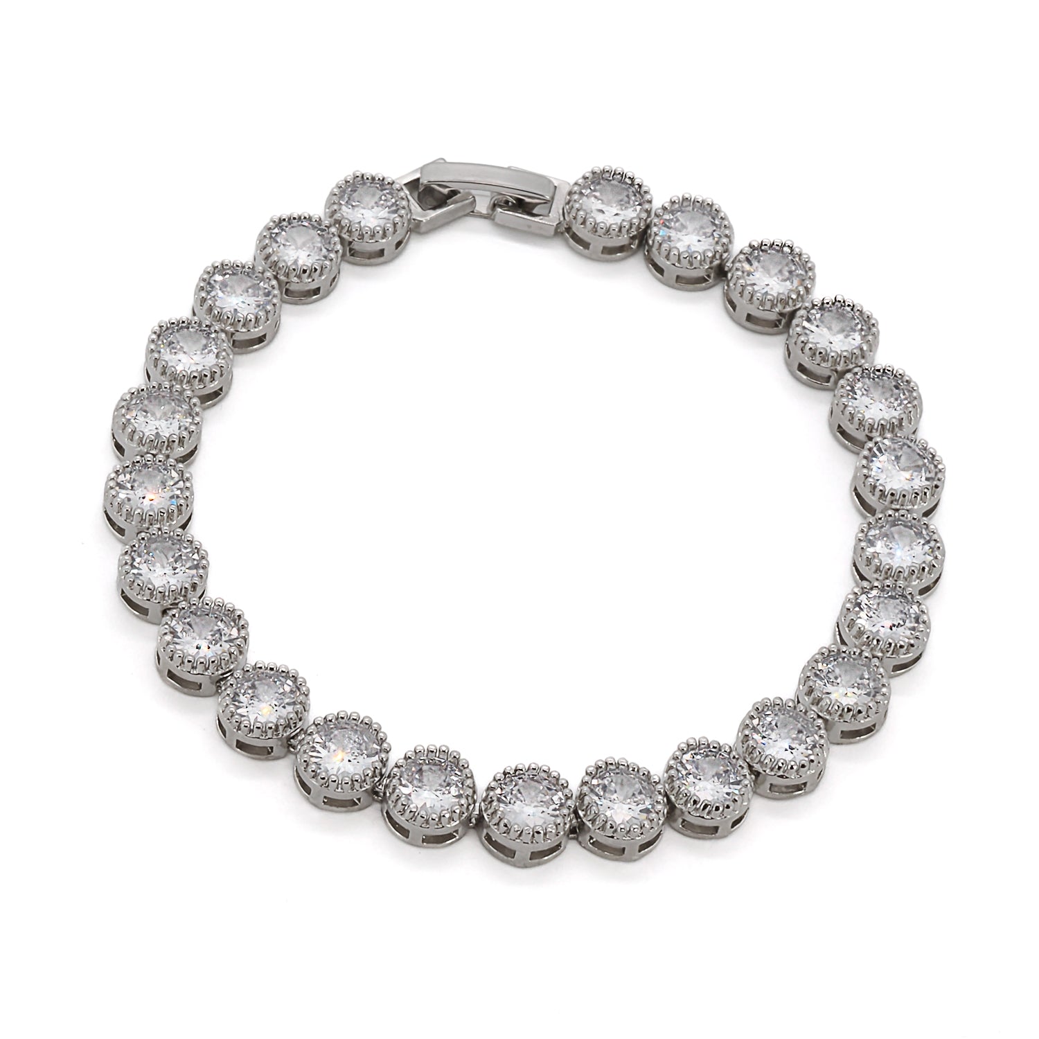 Close-up of the Diamond Tennis Bracelet, showcasing its intricate silver on brass band and sparkling zircon stones.