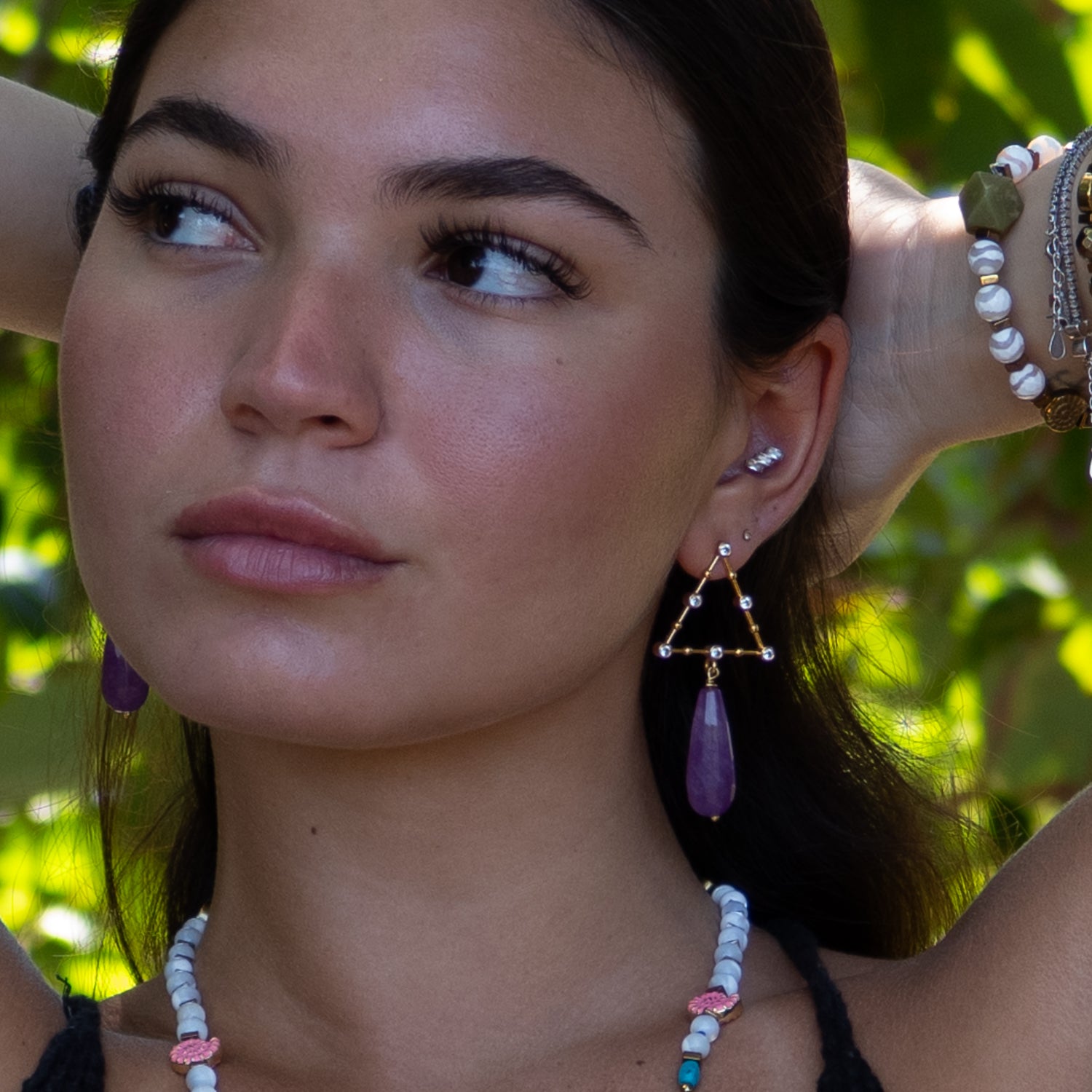 Handmade earrings featuring natural amethyst teardrops and sparkling CZ diamond triangles

