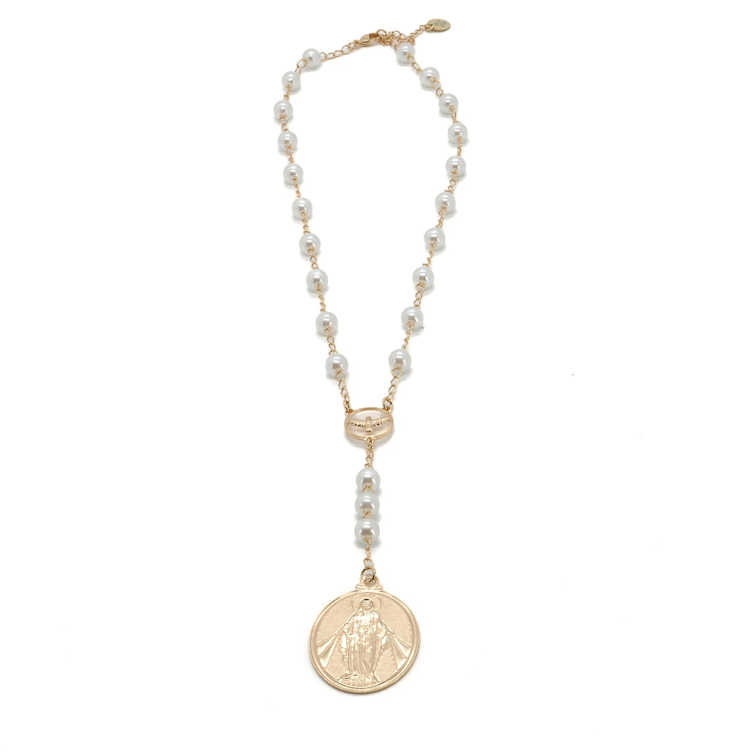 Close-up of gold-plated Virgin Mary charm with pearl drop and eagle connector detail

