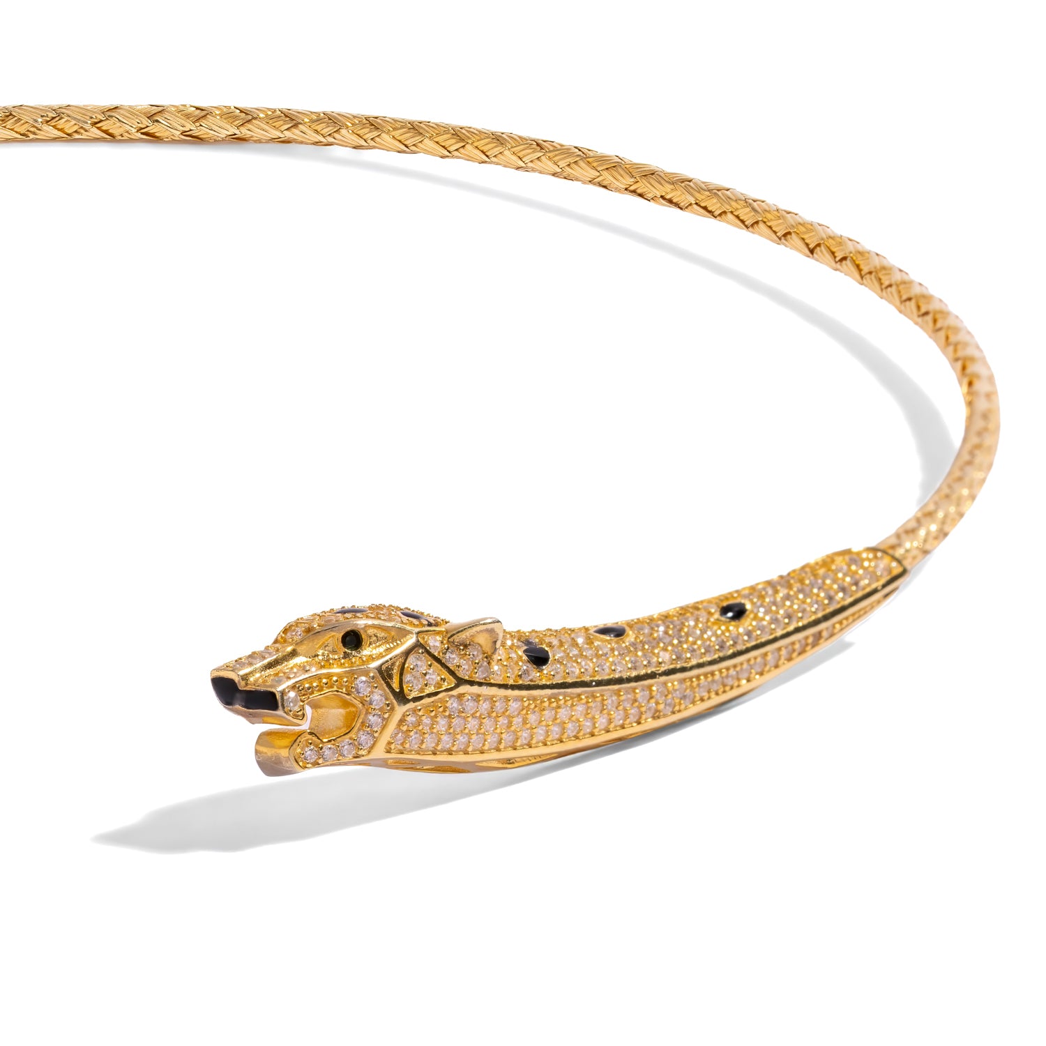 Detail of the pave set panther head and hand woven gold collar with dark stone markings