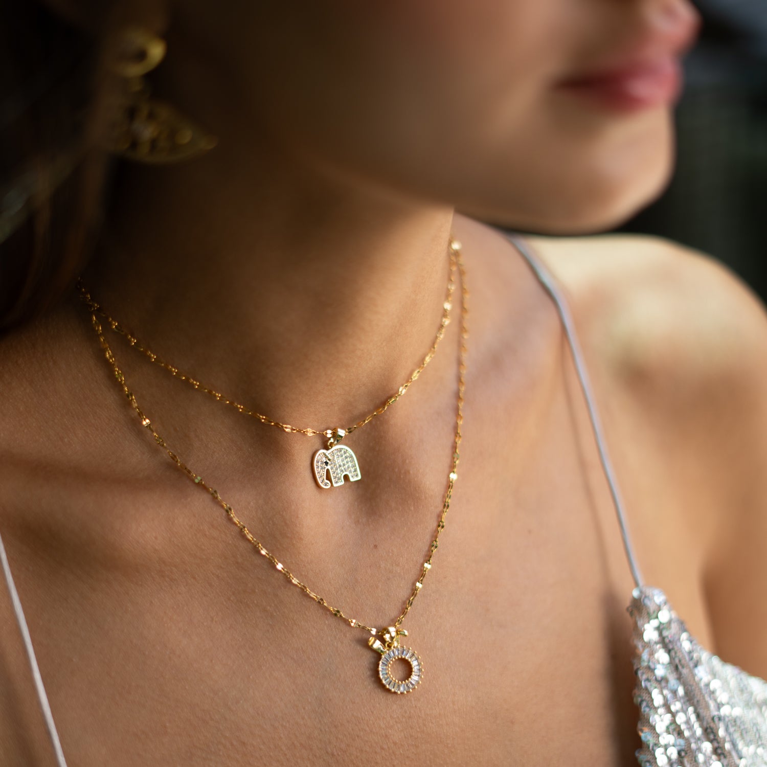 Gold elephant necklace with diamond-style crystals, 15-inch chain
