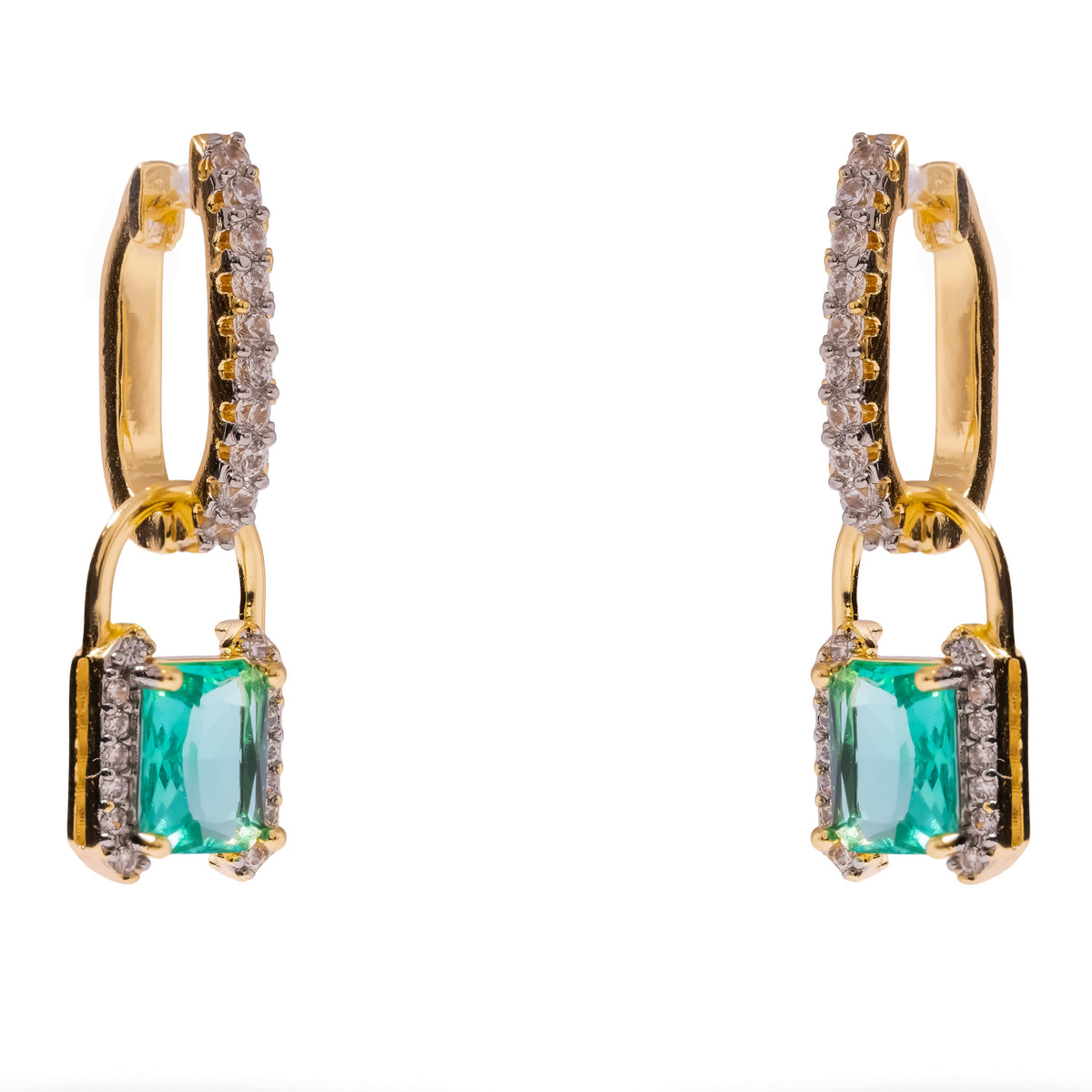 Close up of the emerald cut mint green zirconia set in gold padlock drops framed with white zirconia