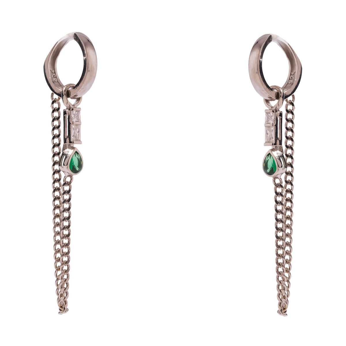 Close view of both huggie earrings showing the baguette stone above the pear shaped emerald and the looping chain