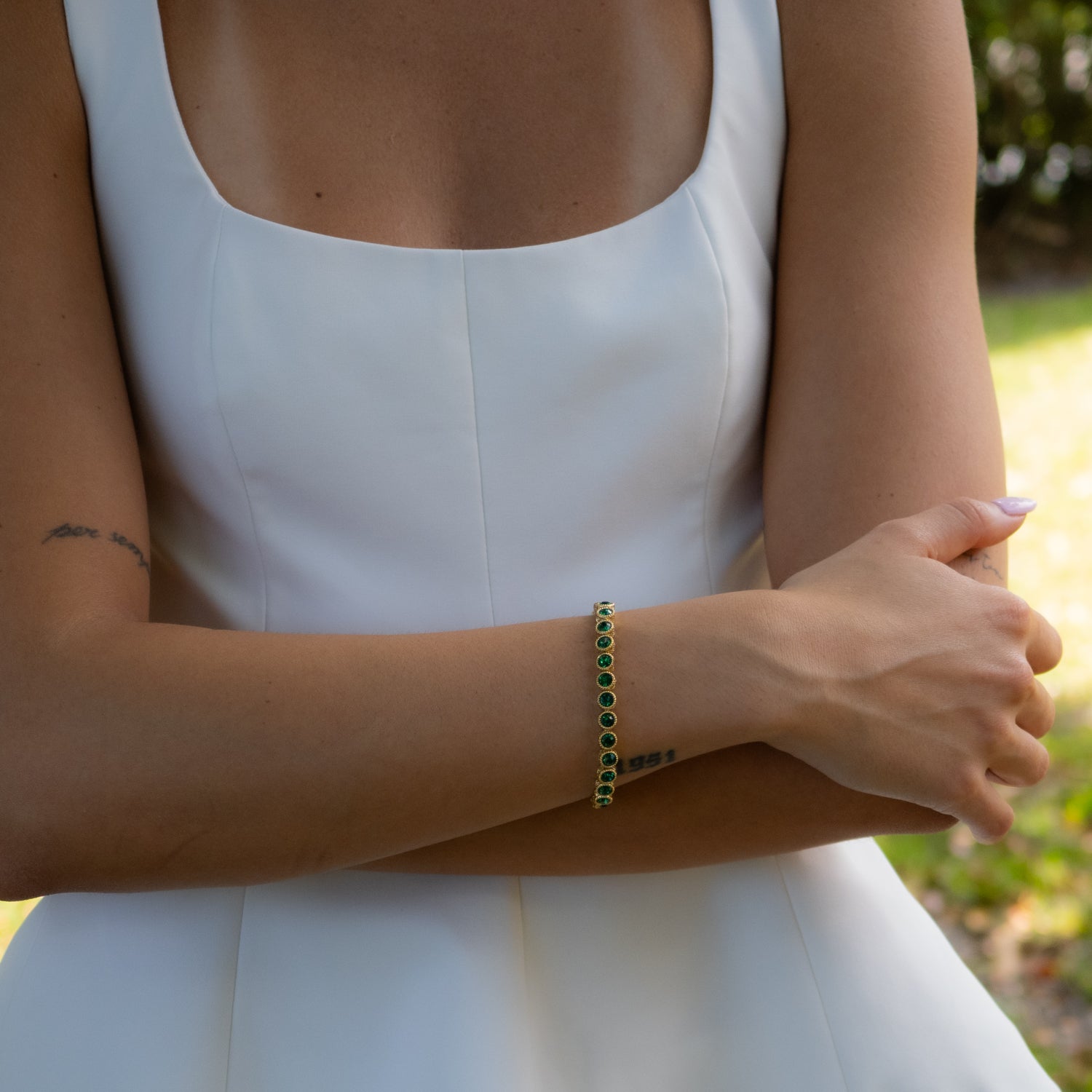 Elegant Gold-Plated Emerald Tennis Bracelet with Mystic Spiritual Engravings for Personal Growth

