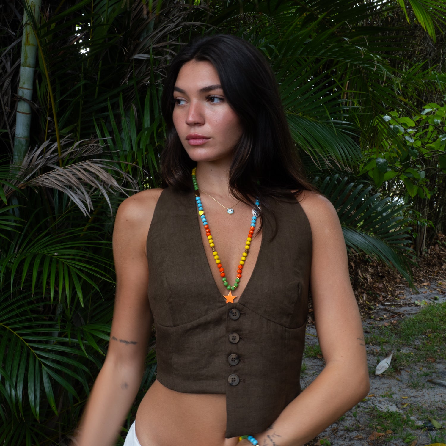 Colorful crystal bead summer necklace with neon orange star pendant on model, Ebru Jewelry