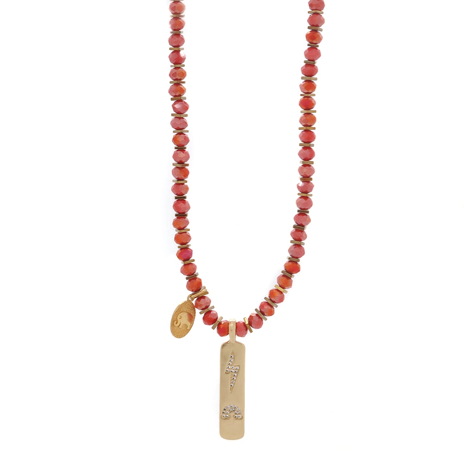 Bold crystal necklace with gold elephant charm and spiritual lightning pendant.

