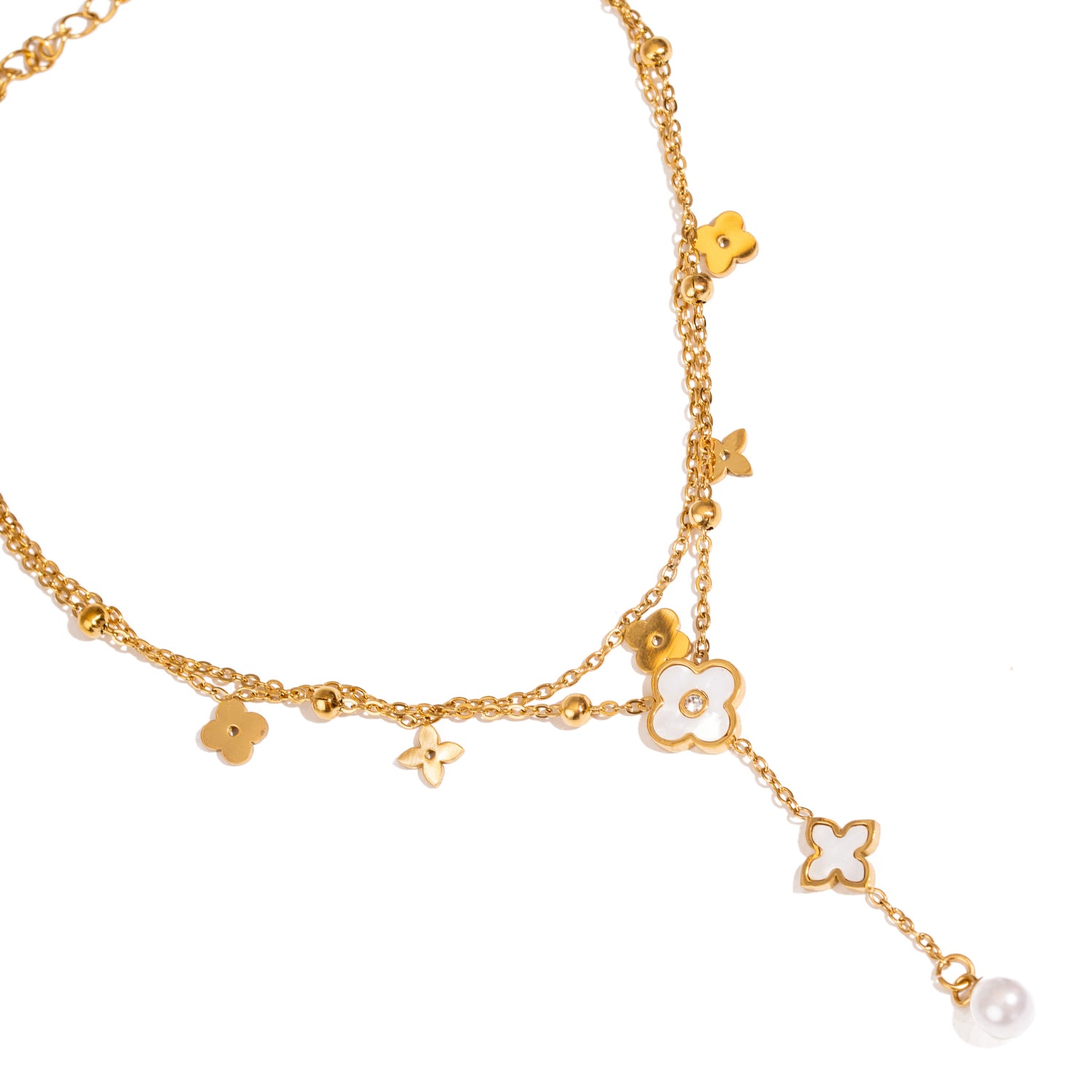 Floral-inspired gold anklet with pearl accents for summer wear