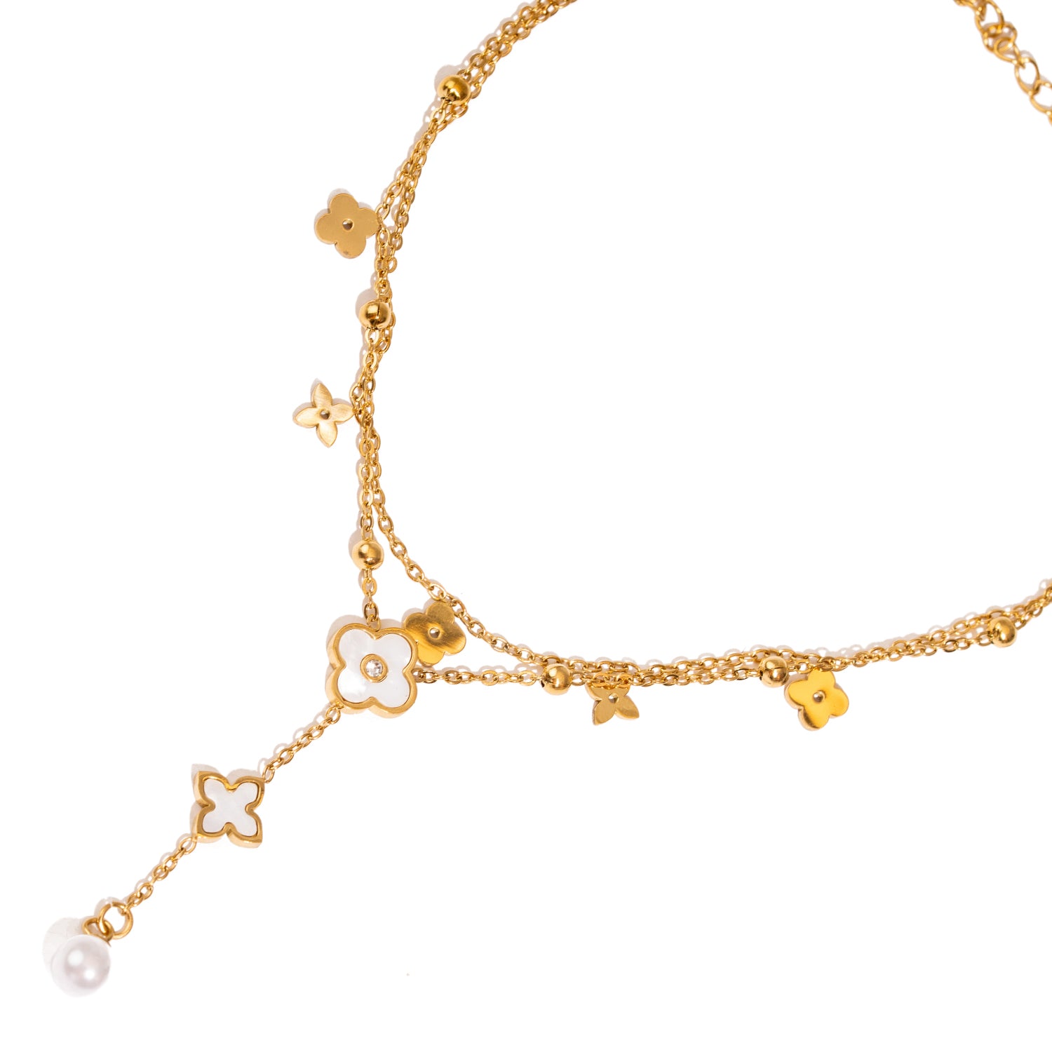 Delicate gold anklet featuring pearls and feminine floral motifs