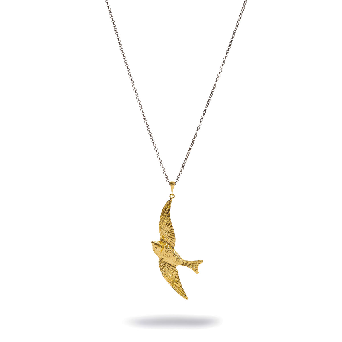 Free Spirit Sparrow Gold Pendant Two Tone Necklace shown full length, fine oxidized silver chain with the gold sparrow pendant