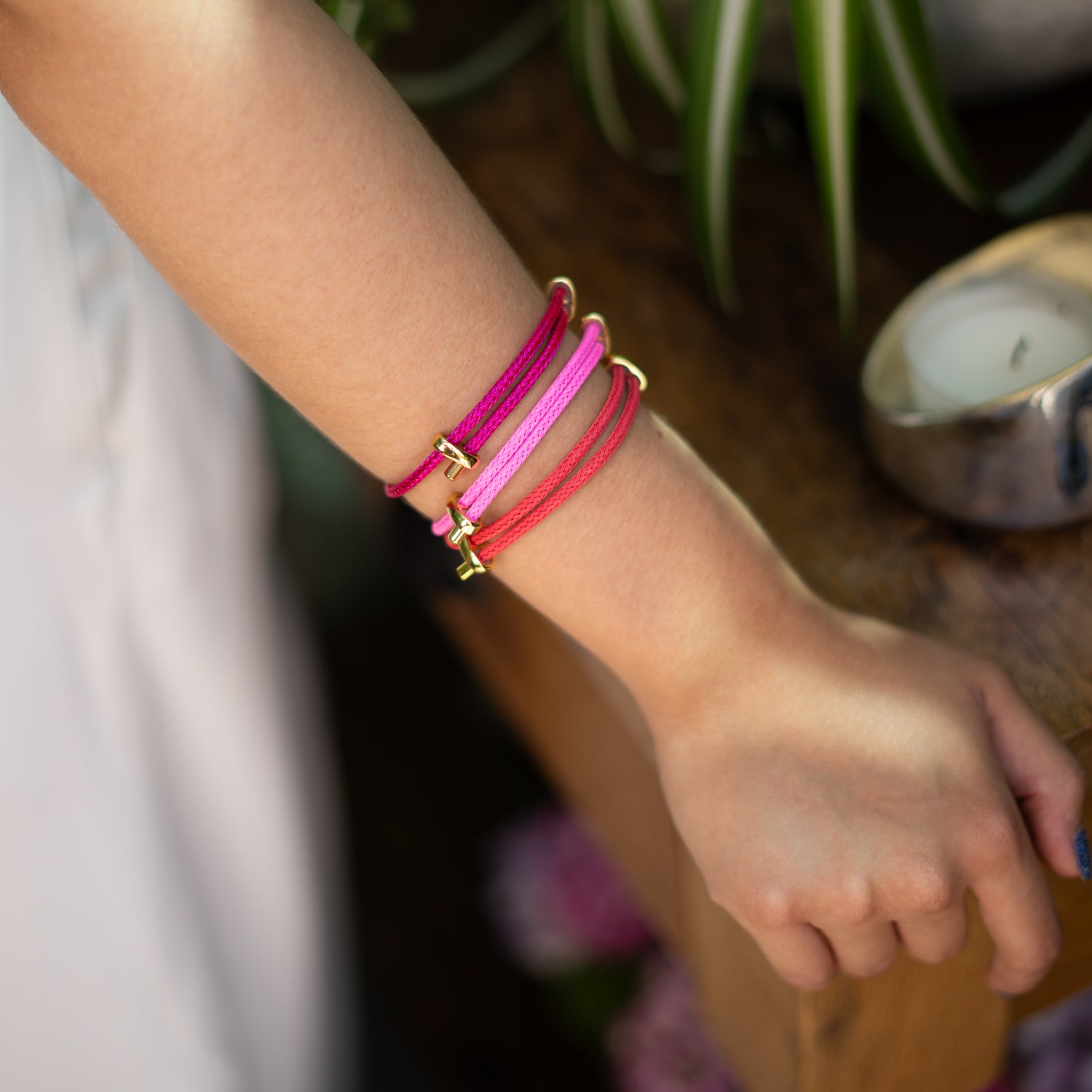Fuchsia Glow rope bracelet with stainless steel gold finish