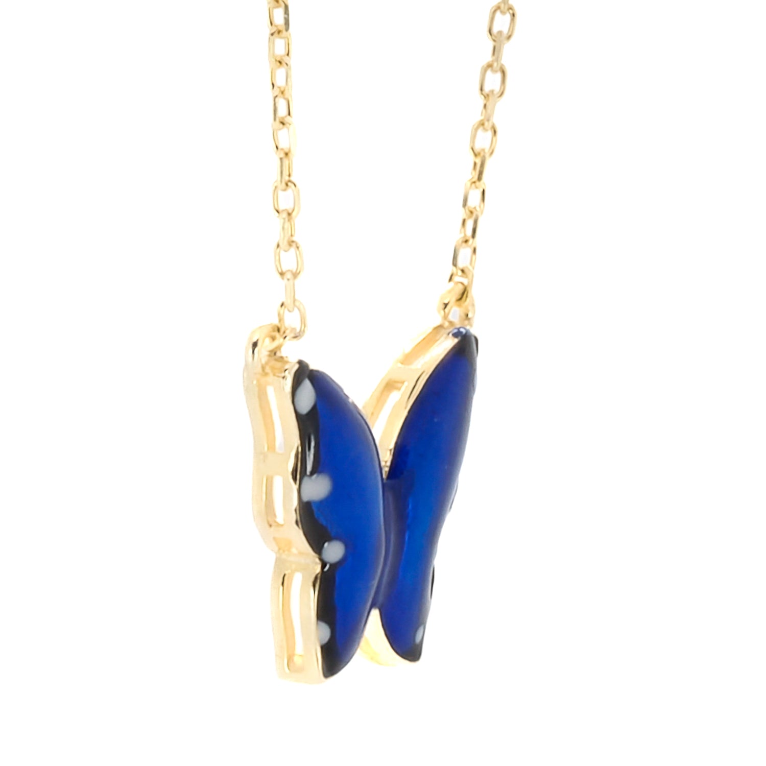 Gold Spiritual Blue Enamel Butterfly Necklace, a handmade piece of jewelry that inspires spiritual growth and self-transformation.