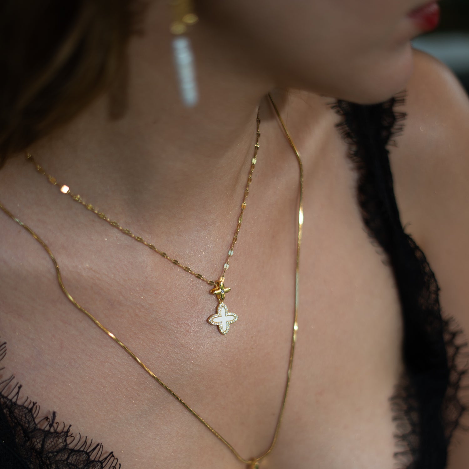 Four-leaf clover charm necklace for protection and positive energy
