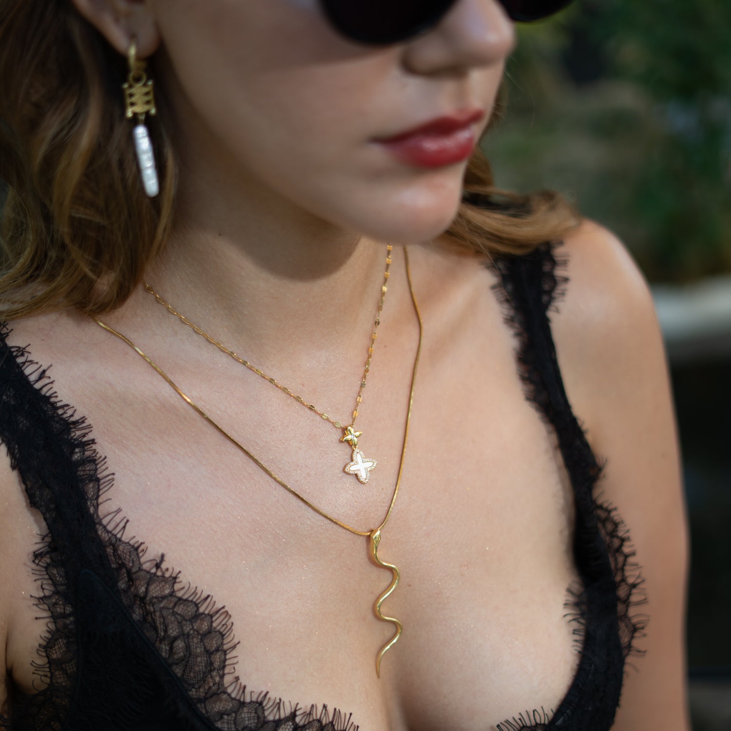 Gold stainless steel clover necklace with cubic zirconia trim