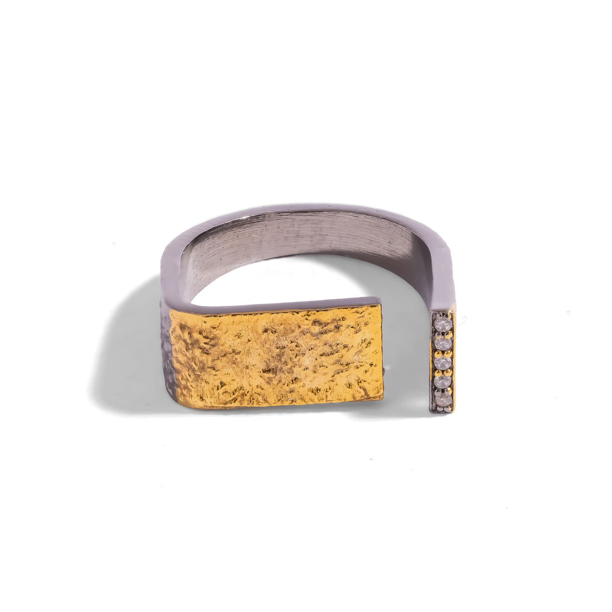 Golden Contrast Two Tone Statement Ring on white, gold panel and zircon line facing each other across the open band