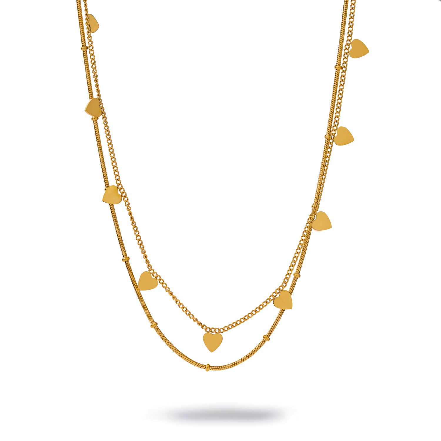 Gold layered necklace with double chains and small heart charms in 18K gold-plated stainless steel.
