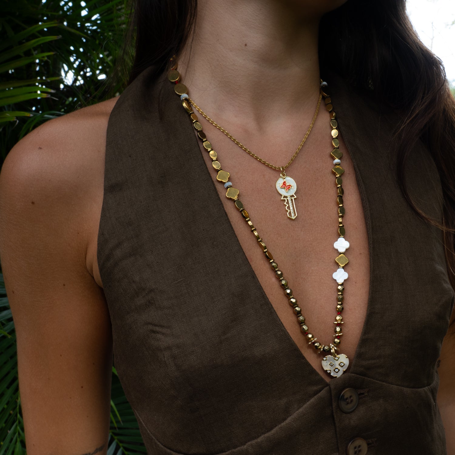Good Luck key pendant necklace styled layered with long beaded necklace by Ebru Jewelry