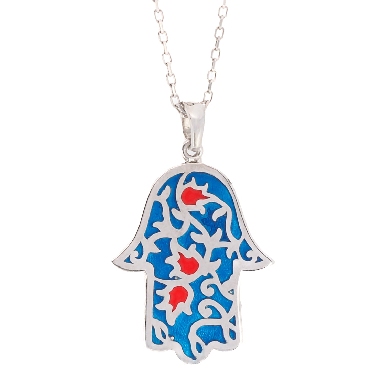 A close-up of the intricate blue and red enamel on the Hamsa pendant of the Good Vibes Enamel Hamsa Necklace Silver.