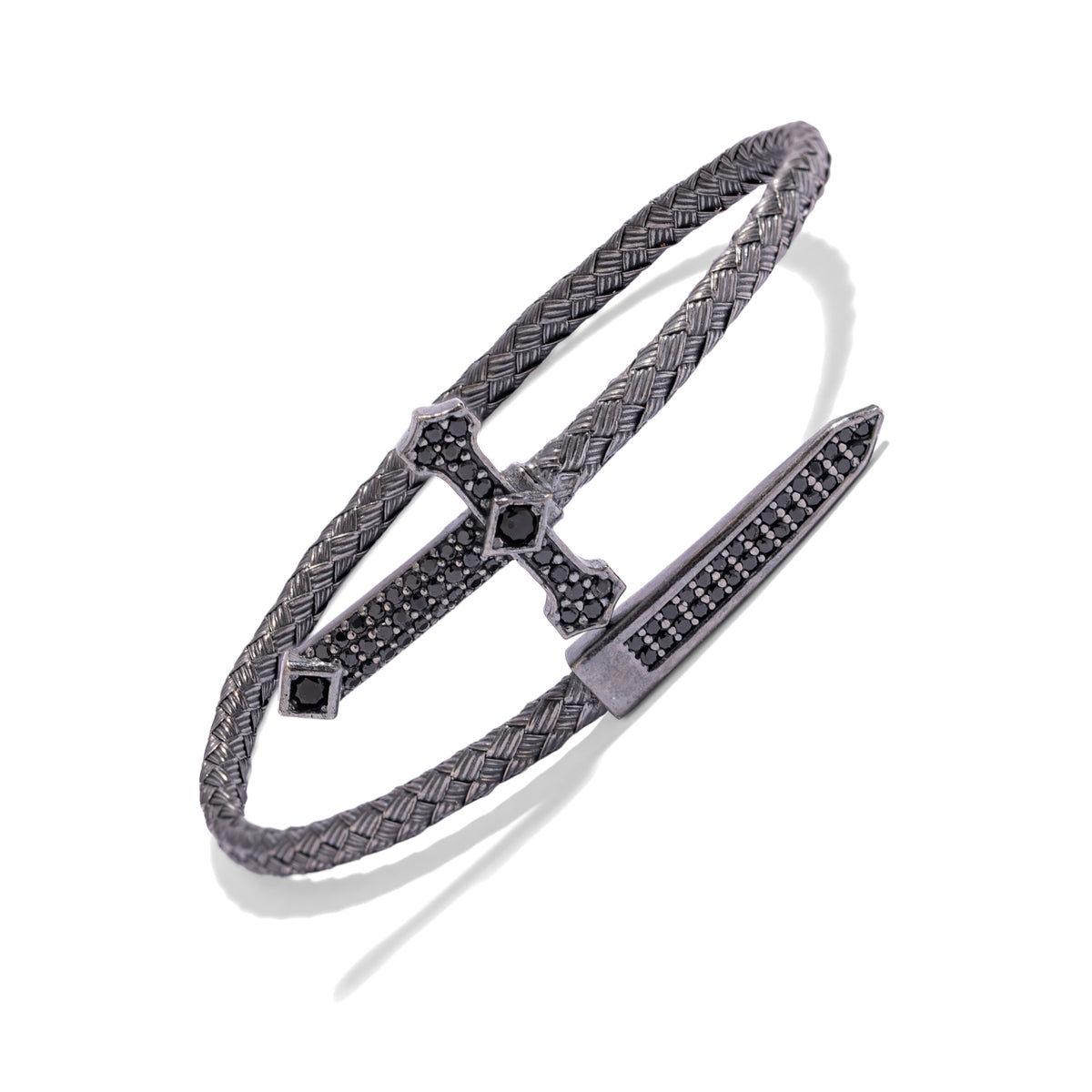 Oxidized sterling silver wrap bracelet seen from above, the Gothic cross and pave dagger point overlapping on the woven band