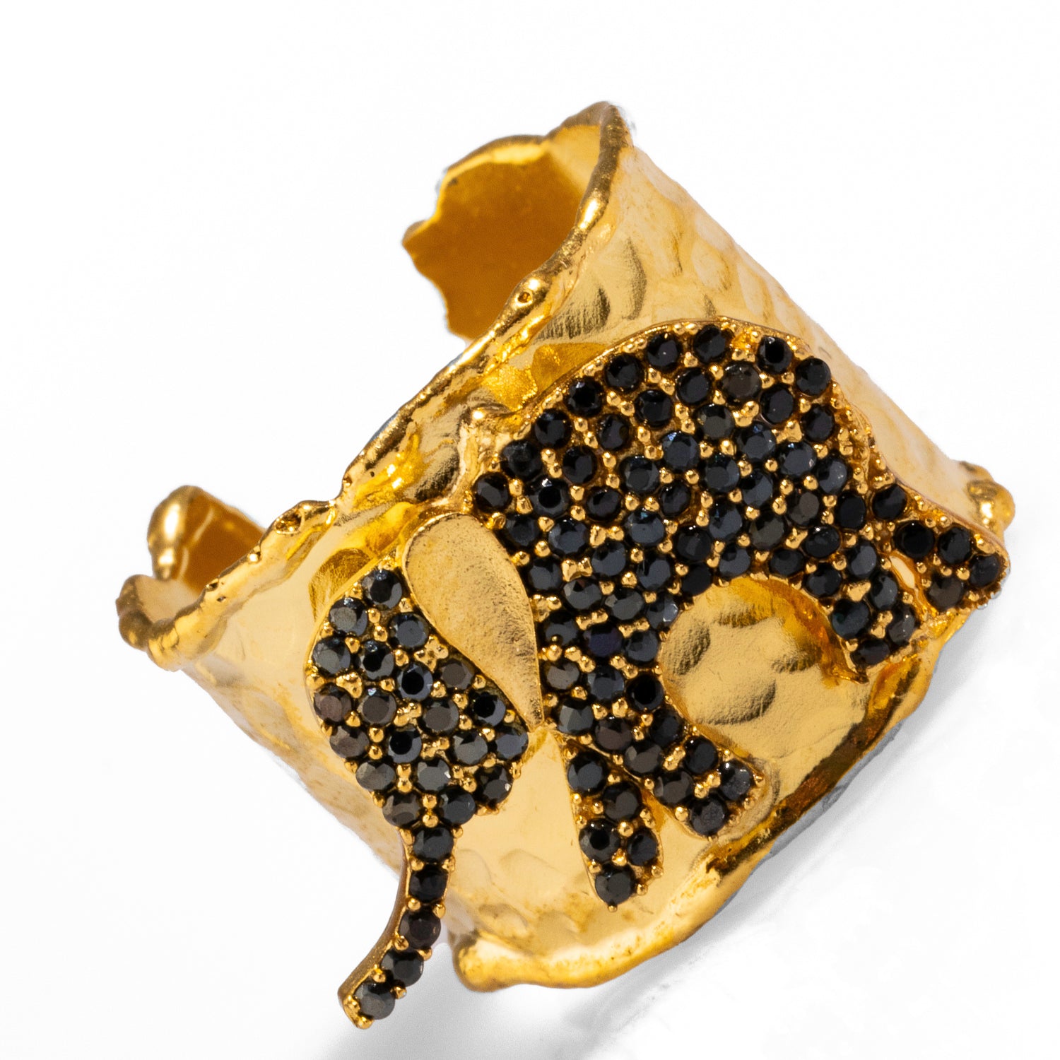 Luxurious 24k gold-plated ring with a black crystal elephant, combining protection and elegance in an adjustable design.
