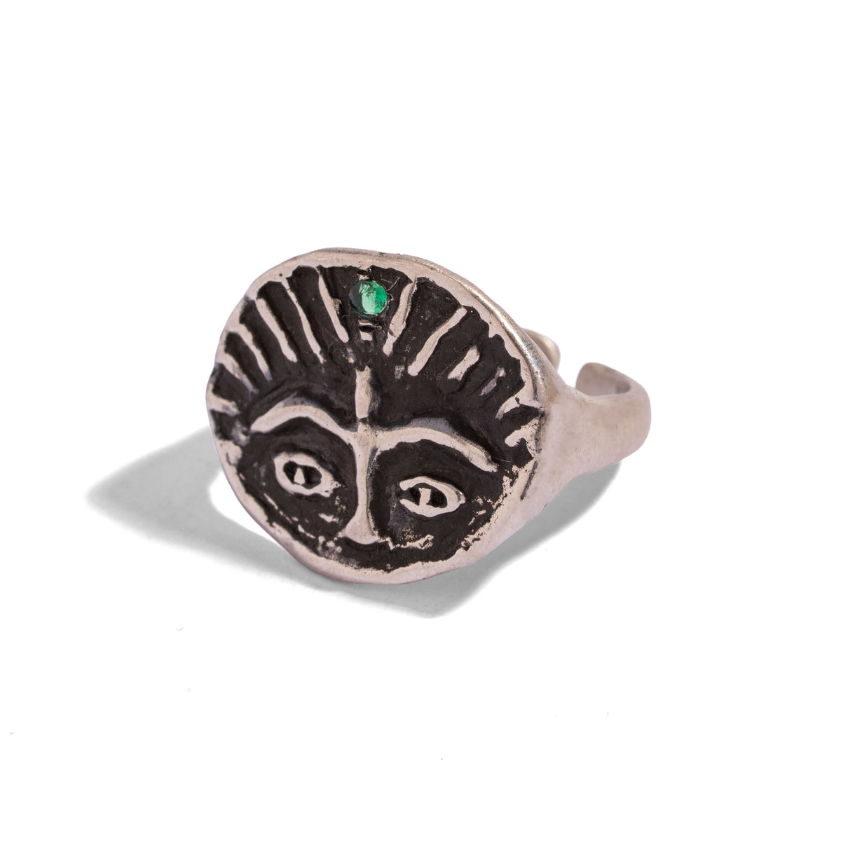 Guardian Emerald Eye Adjustable Sterling Silver Ring on white, the open adjustable band behind the carved face