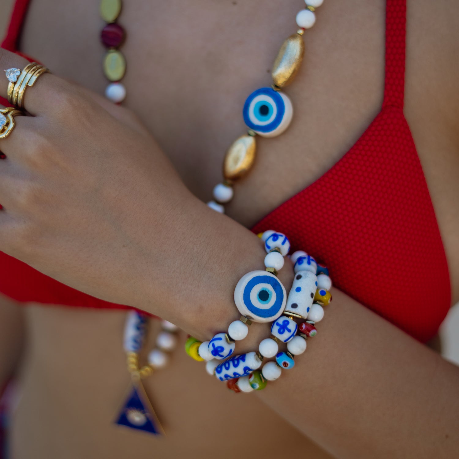 Guardian Eye White Jade Beaded Long Necklace styled on neckline, highlighting the extra-long 33-inch length