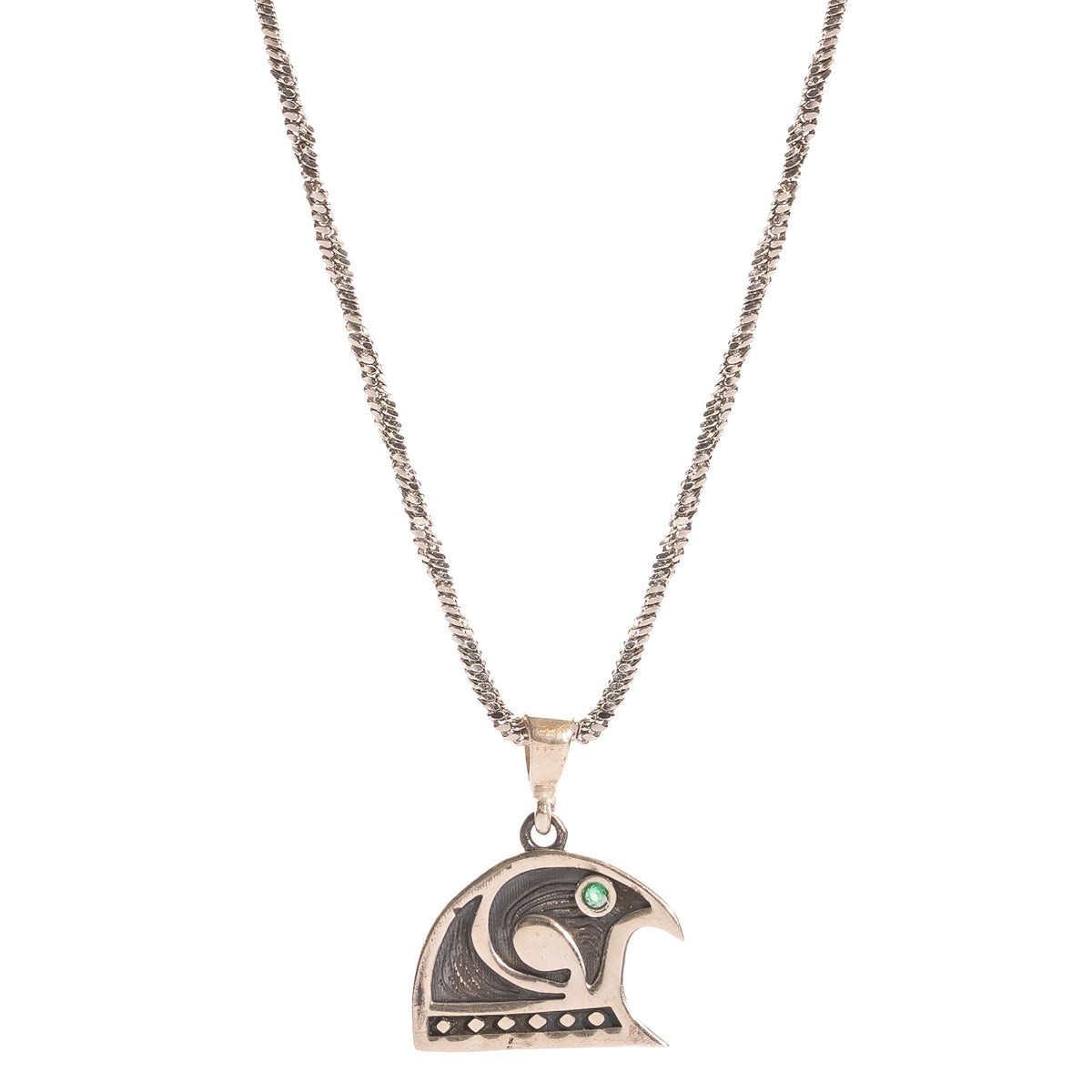 Guardian Falcon Emerald Eye Silver Men's Necklace laid flat, falcon pendant with beaded lower edge and emerald eye