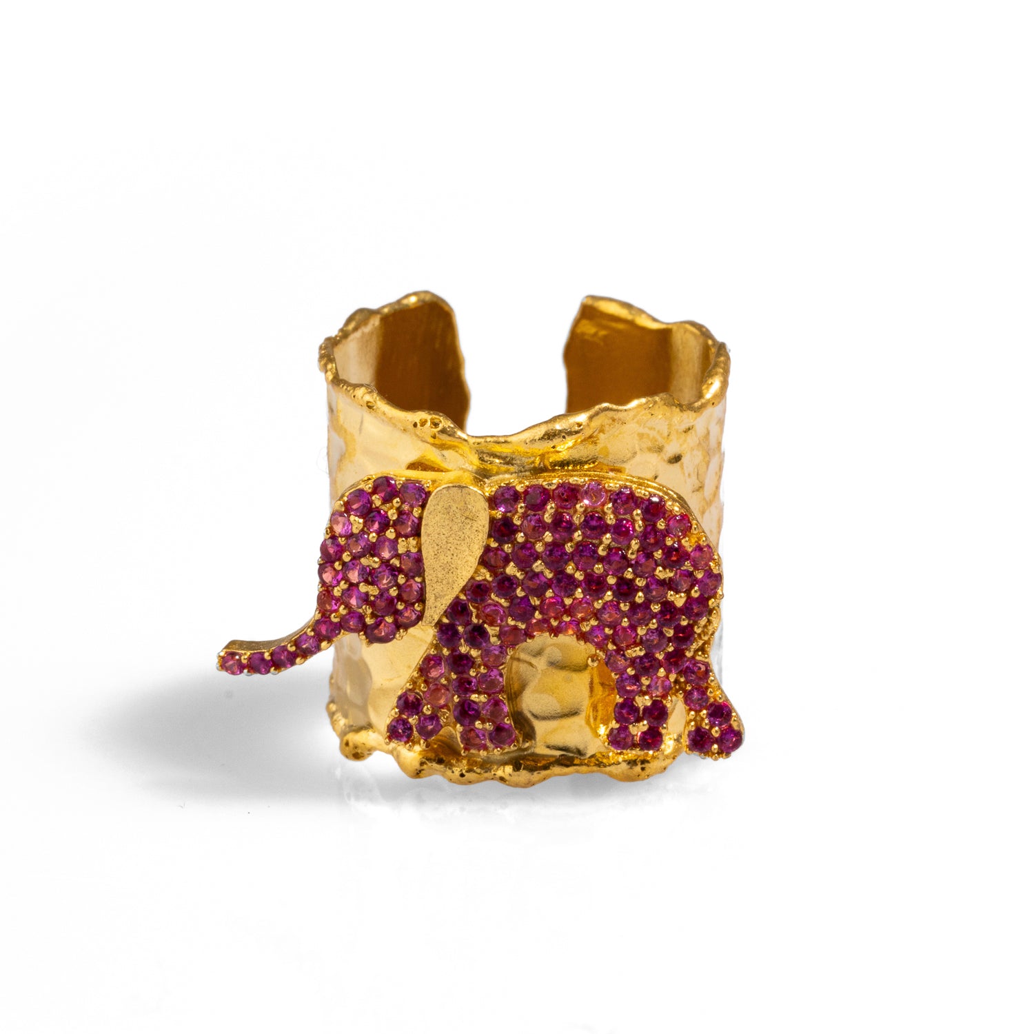 Chunky gold ring with a detailed pink Swarovski crystal-adorned elephant, crafted from 24k gold-plated brass and adjustable for a perfect fit.
