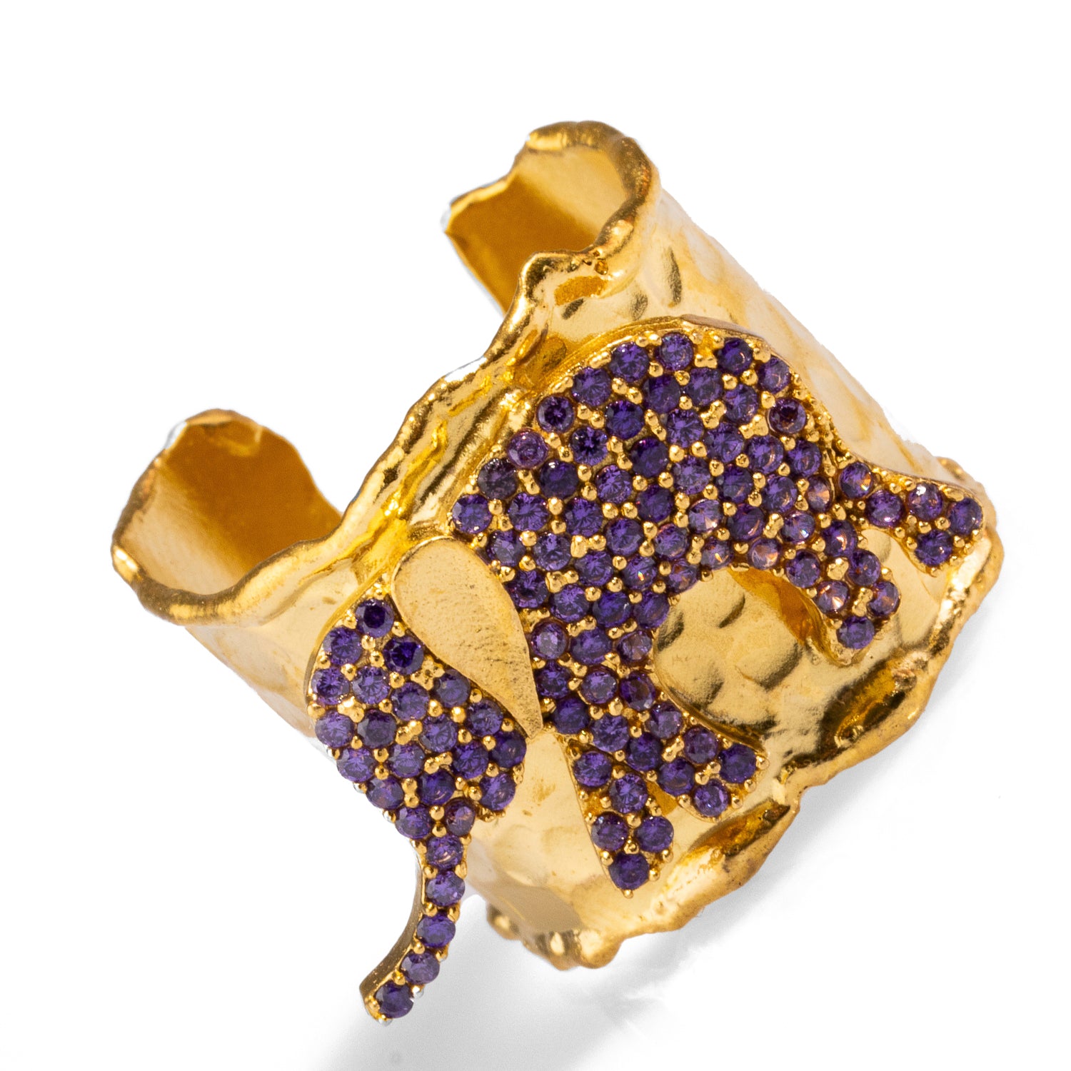 Bold ring with a purple Swarovski crystal elephant in a chunky gold setting, adjustable band for comfort and style.
