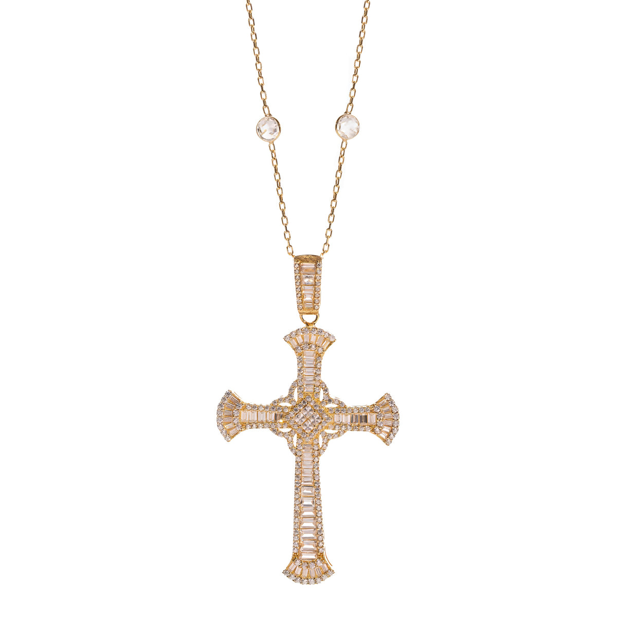 Flared gold cross necklace with bezel set stones along the chain, shown on a white background
