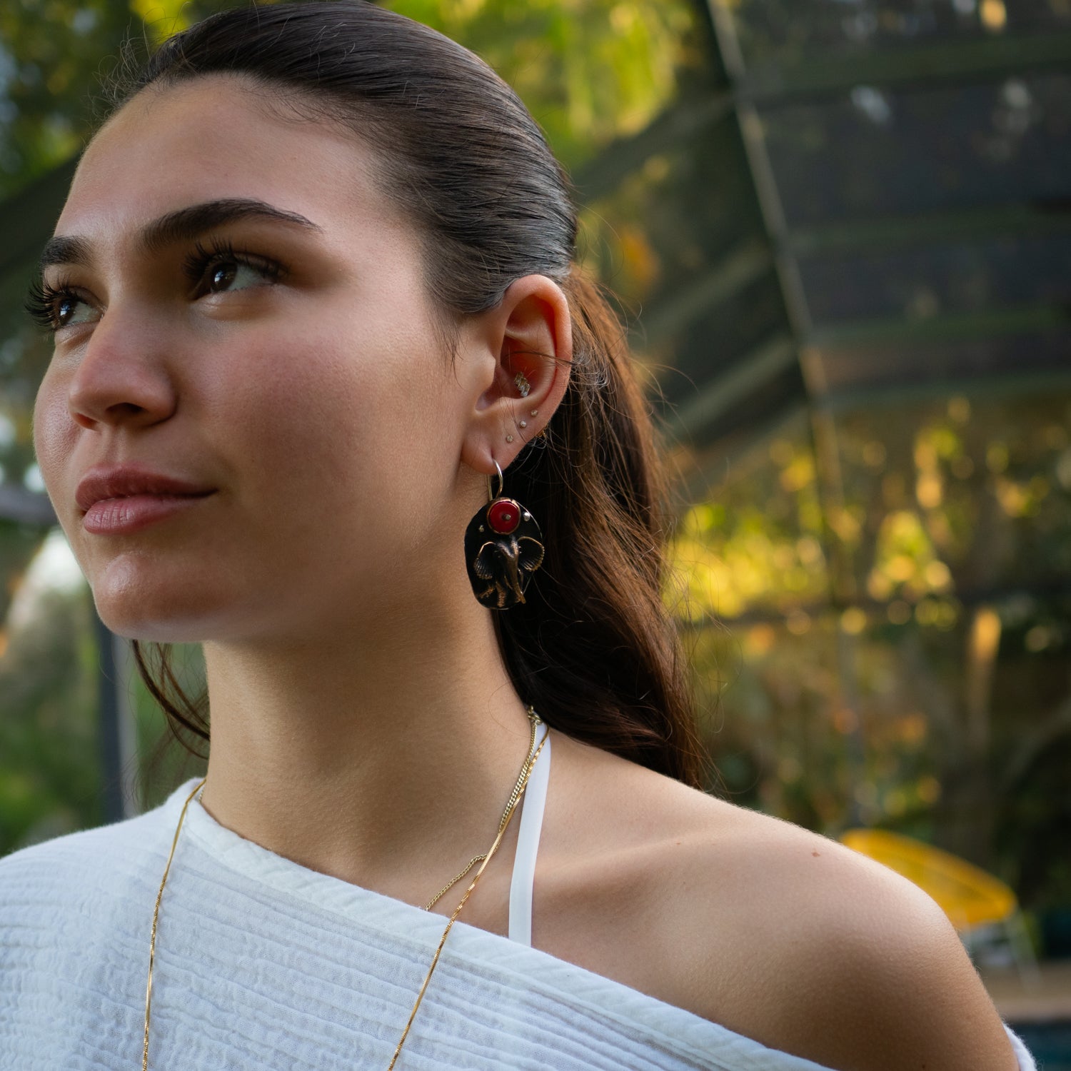 Handmade Spirit Elephant Earrings with Coral Stones and Bronze, Combining Modern Elegance with Timeless Charm

