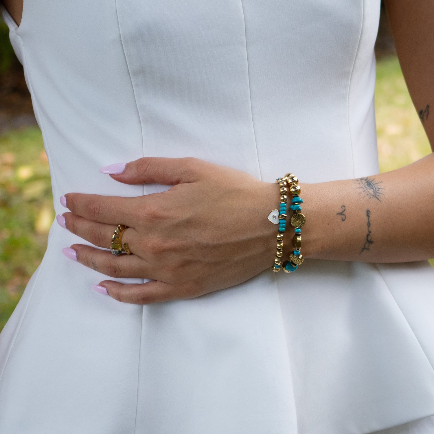 Gold and turquoise spiritual bracelet set designed to inspire calm and clarity

