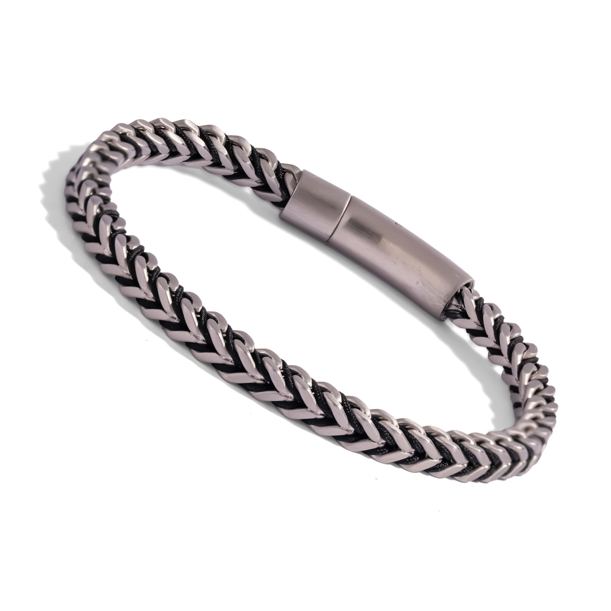 Angled view of the men's foxtail chain bracelet showing the black cord between the steel links and the brushed clasp