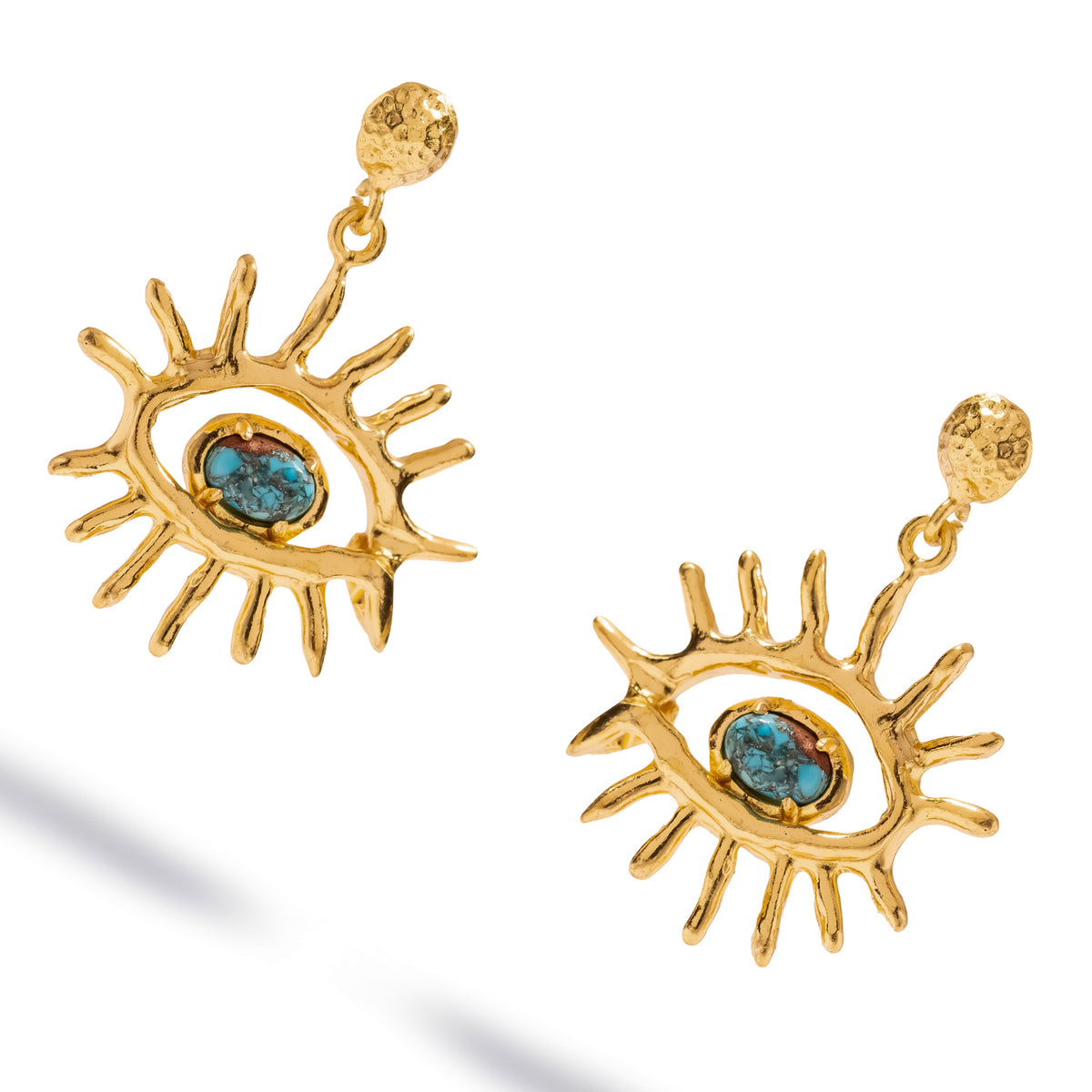 Angled view of the Kept Safe Evil Eye Turquoise Gold Drop Earrings showing the hammered disc top and the drop