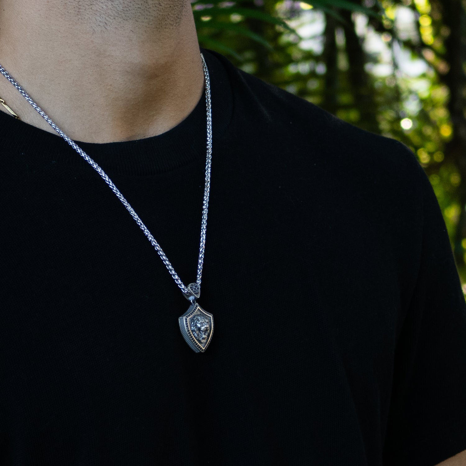 Sterling silver Lionheart Shield men’s necklace with 3D lion head pendant, rhodium-plated finish, bold and masculine design.
