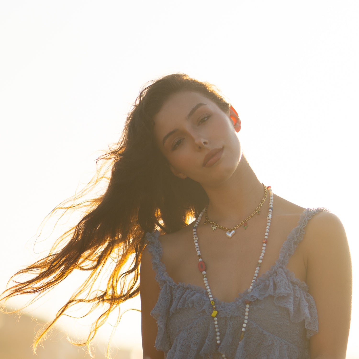 Lightweight layered necklace with enamel charms for spring, summer, and romantic outfits