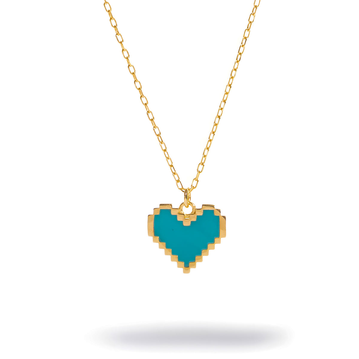 Close up of the turquoise enamel pixel heart pendant with stepped gold outline on a fine cable chain