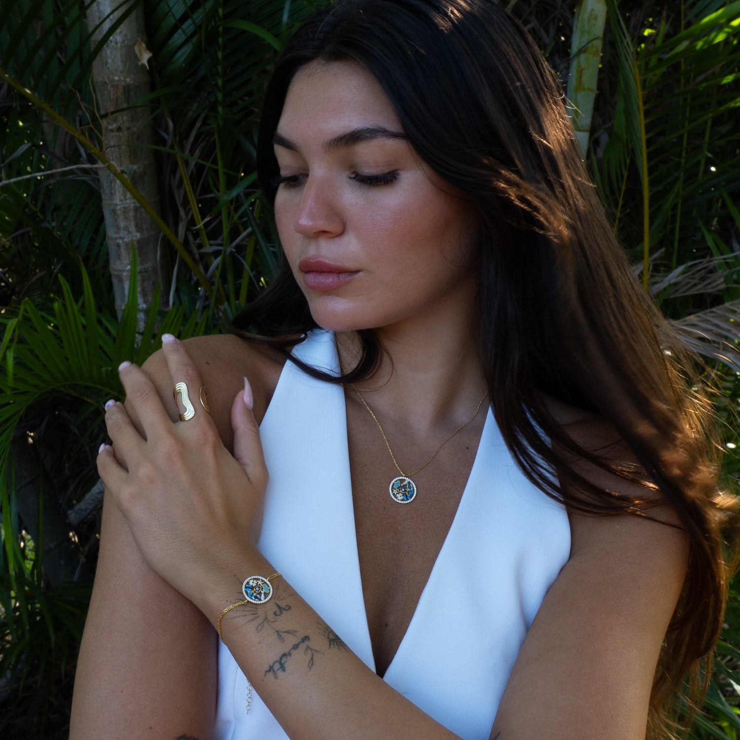 Lucky Charms talisman necklace and matching bracelet worn together by Ebru Jewelry