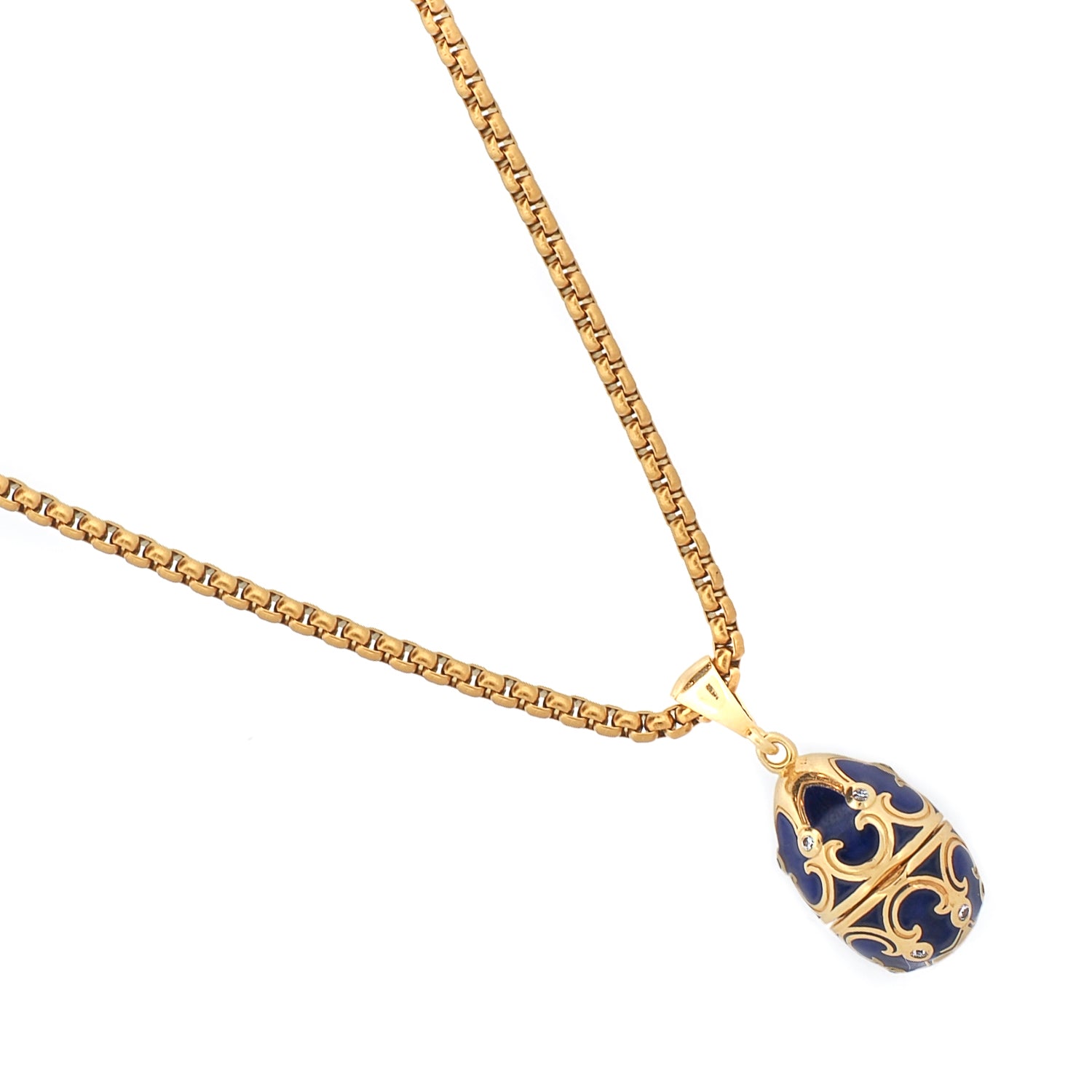 Gold necklace with a blue egg-shaped pendant on a white background