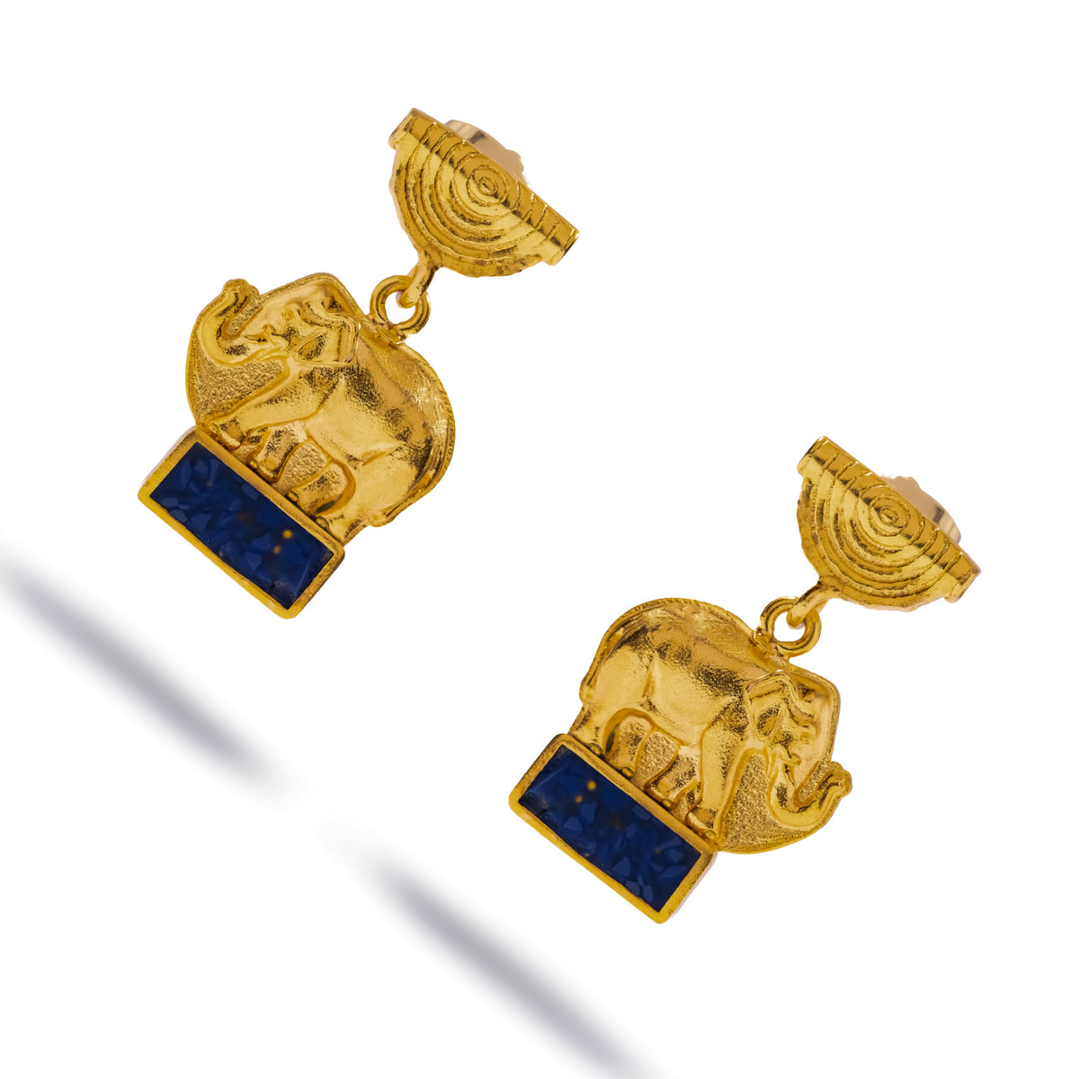 Angled view of the Lucky Elephant Lapis Lazuli Gold Drop Earrings showing the concentric rings of the sun disc top