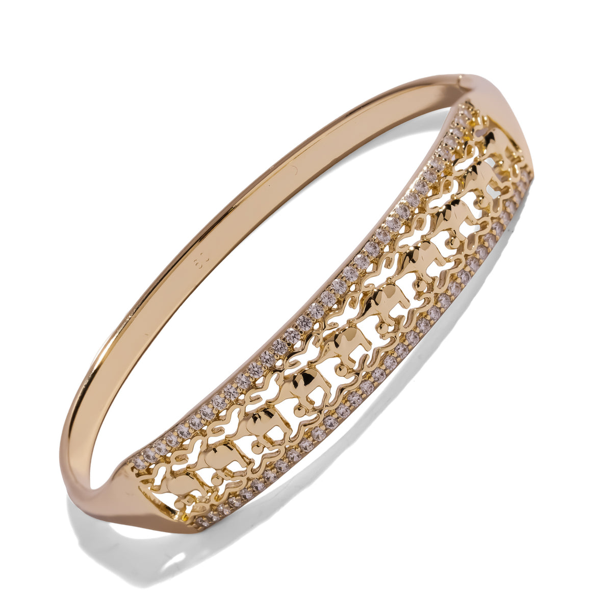Side view of the 18K gold plated elephant parade bangle with rows of pave white zircon